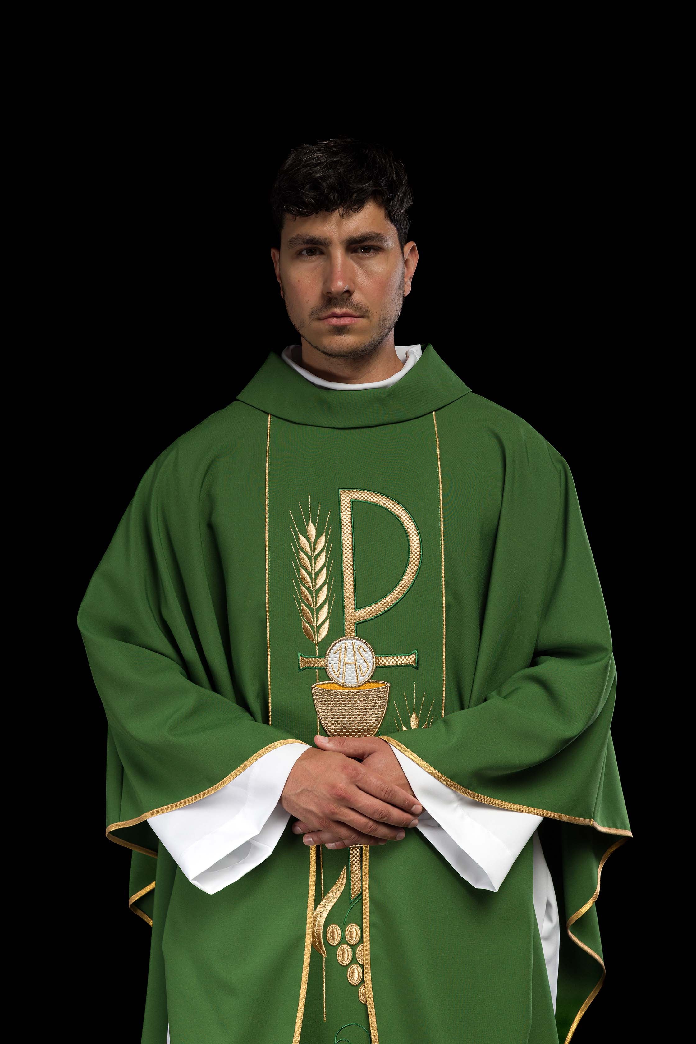 Green chasuble embroidered with IHS Chalice pattern