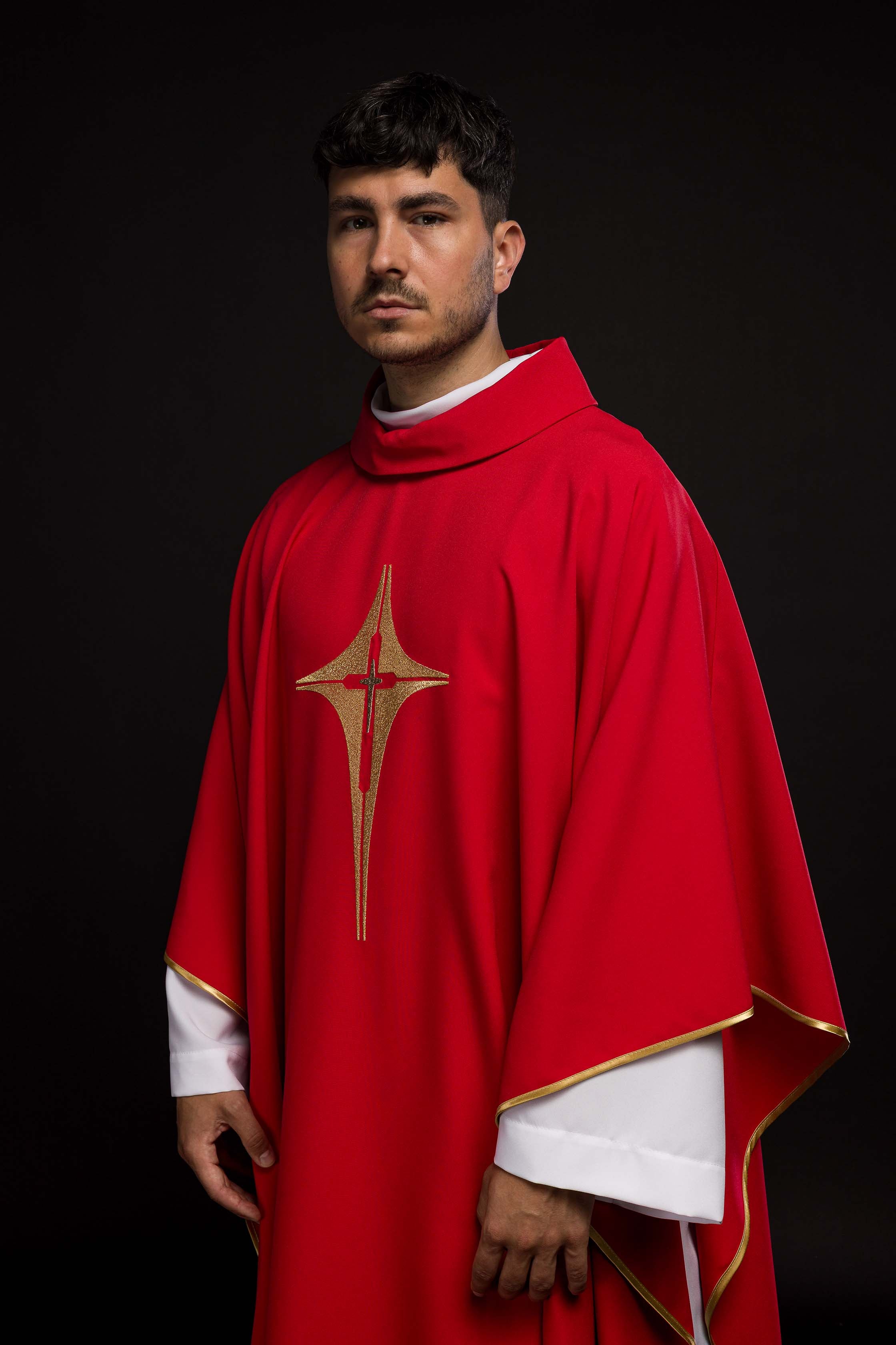 Red chasuble embroidered with cross motif