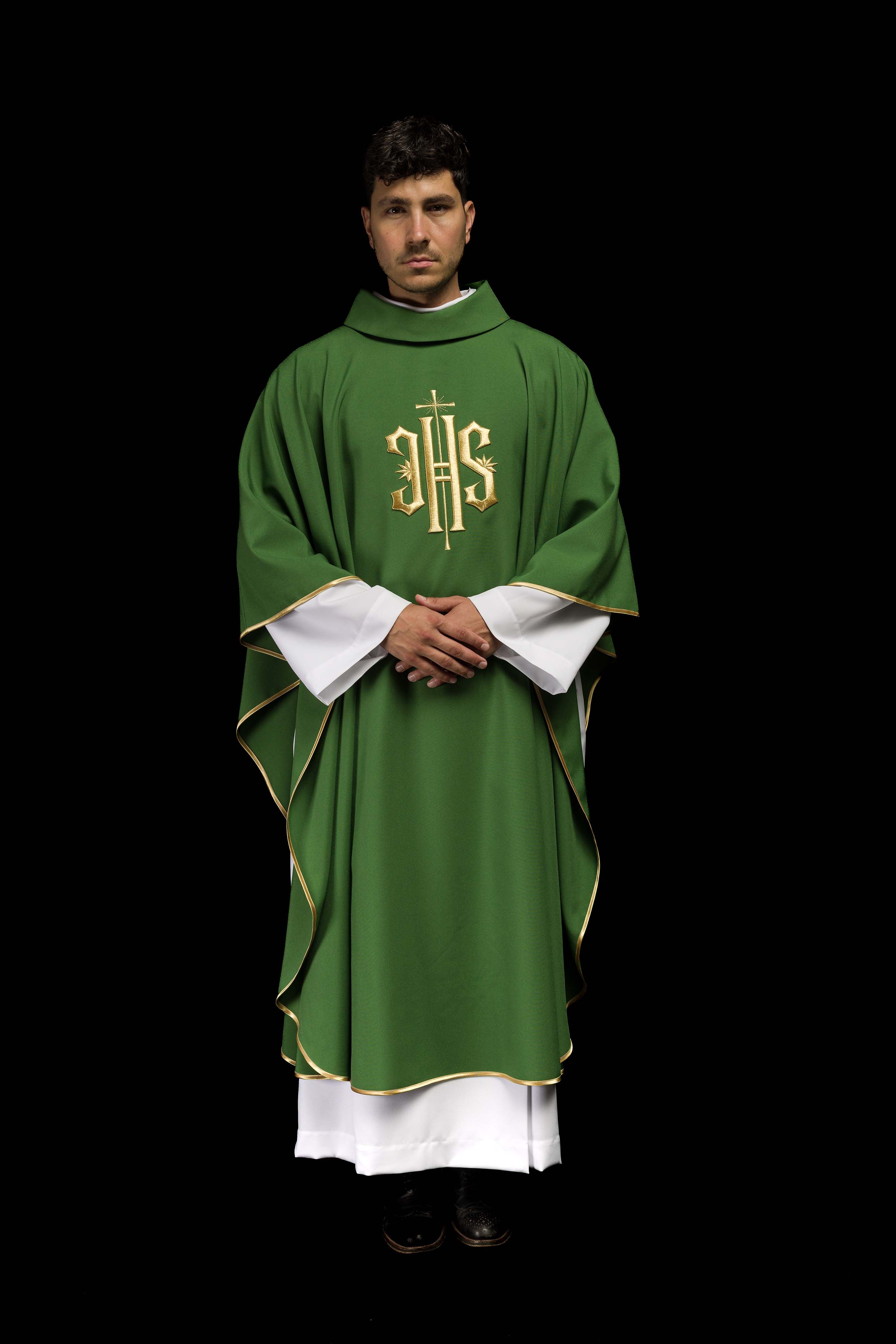 Green chasuble embroidered with IHS motif