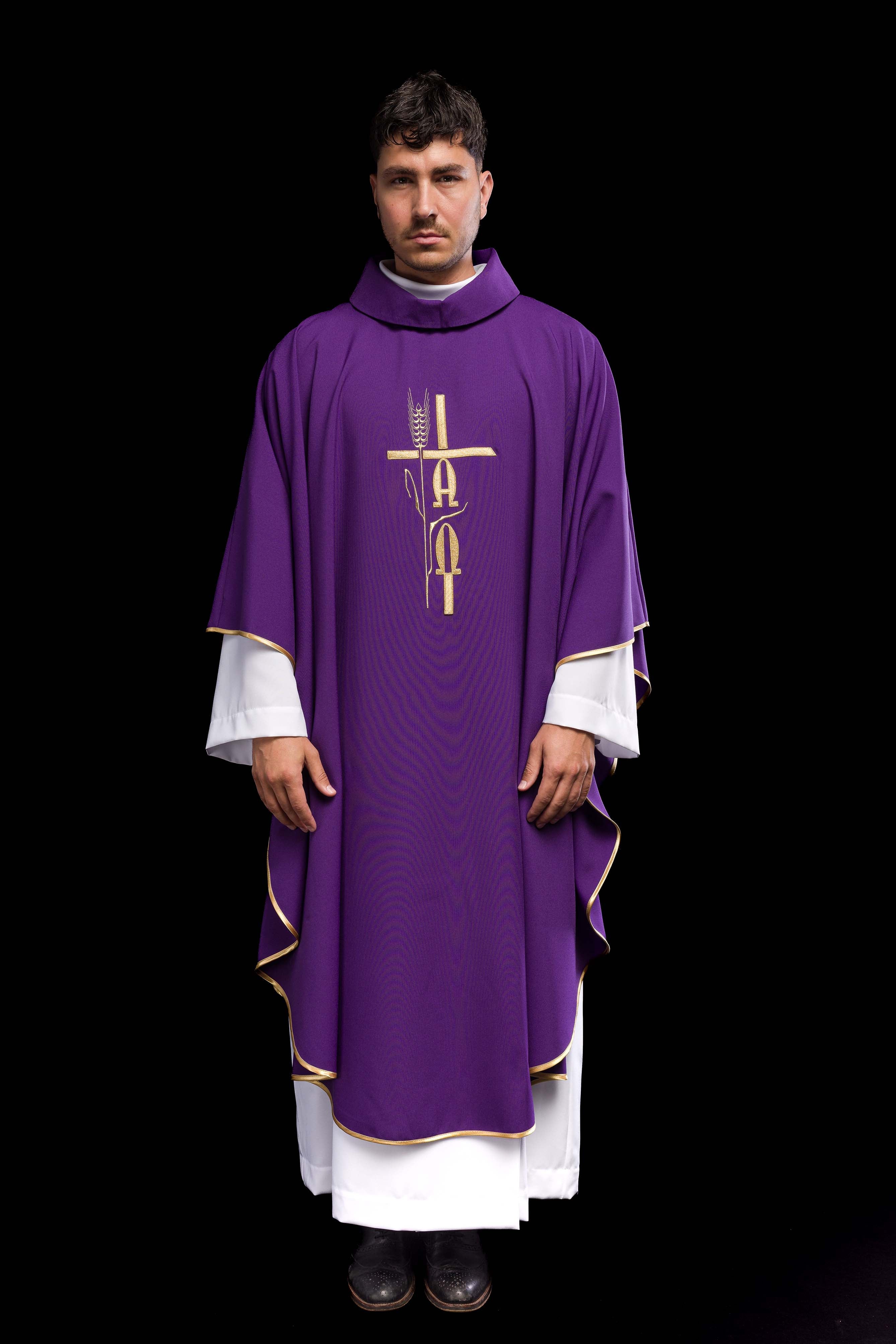 Purple chasuble with cross and alfa omega symbols