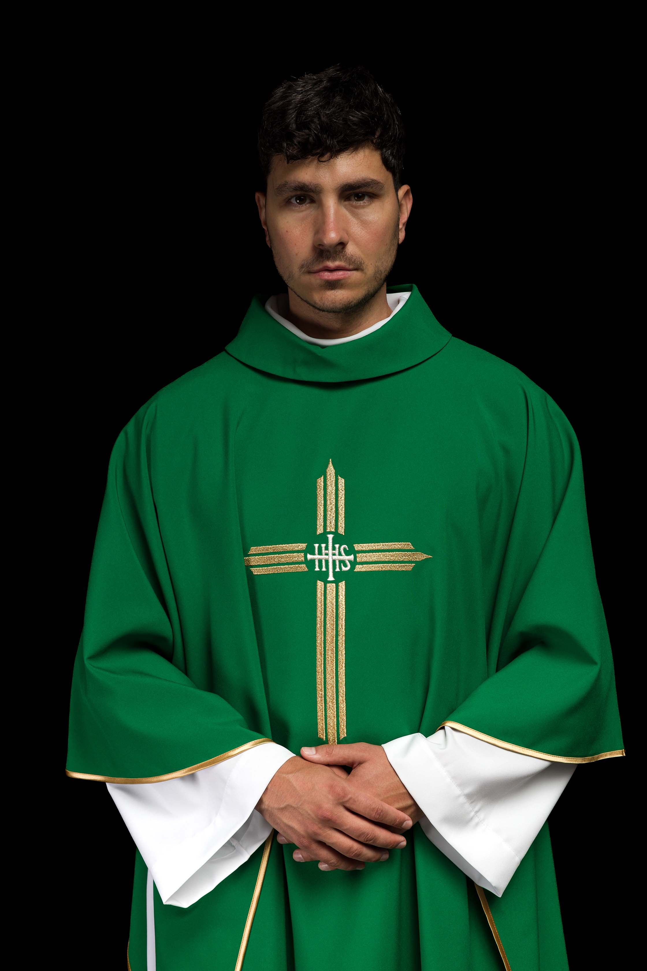 Green chasuble embroidered with the symbol of Cross IHS