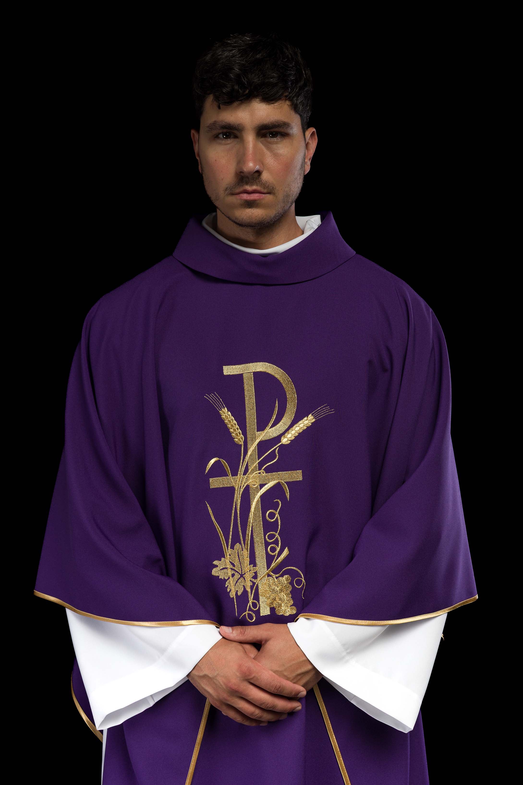 Purple chasuble with golden cross embroidery