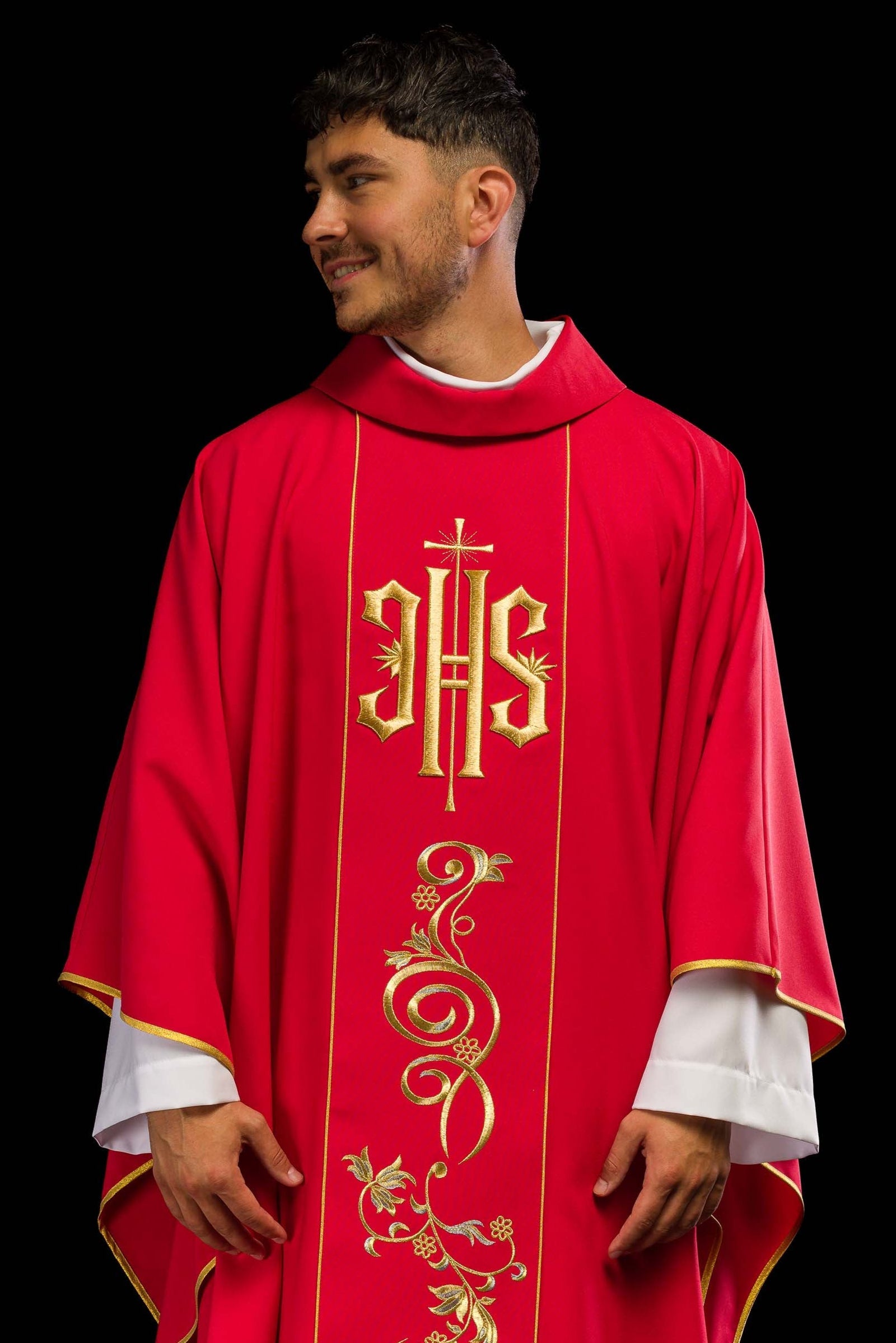 Red chasuble embroidered with IHS