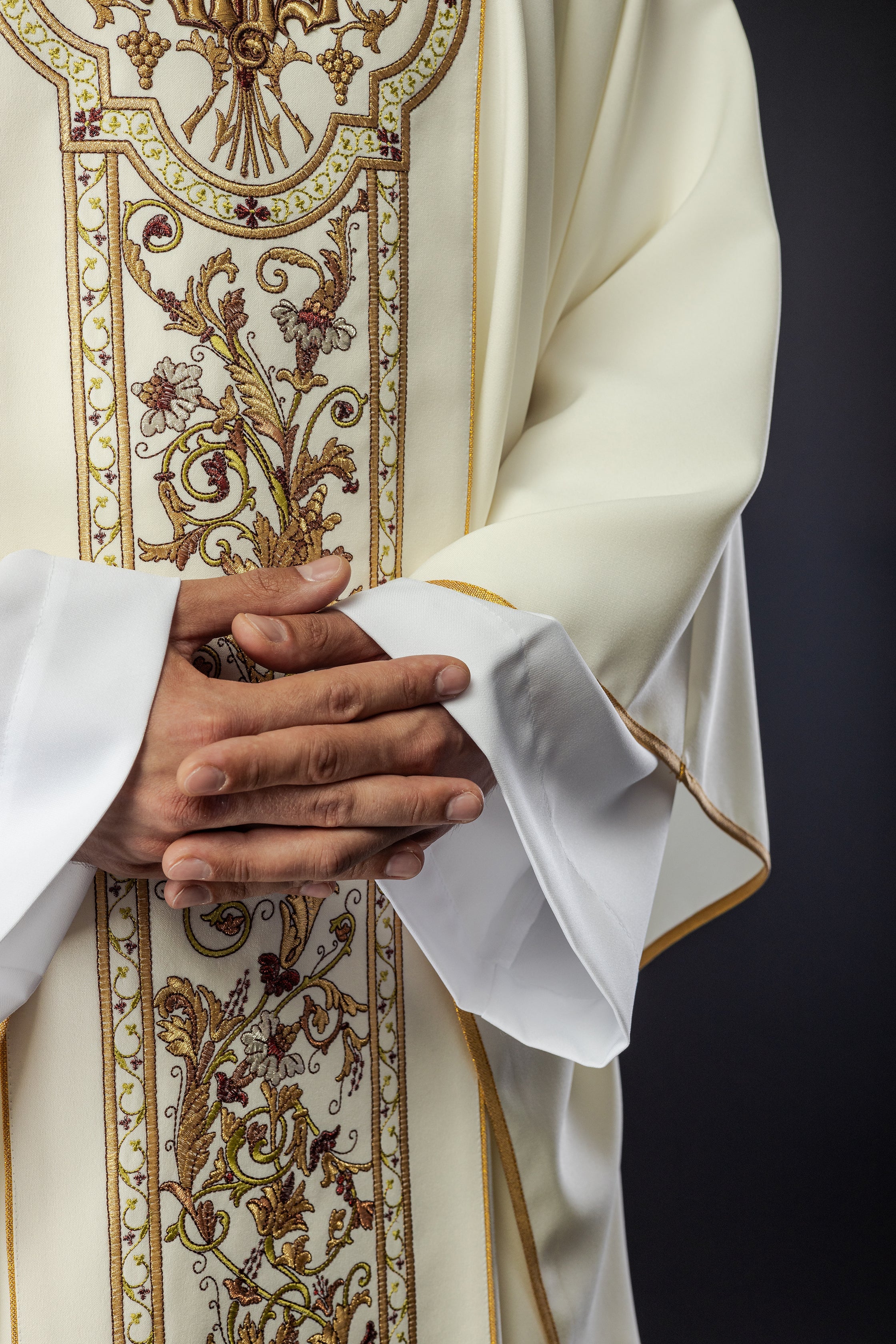 Chasuble richly adorned with IHS motif in ecru