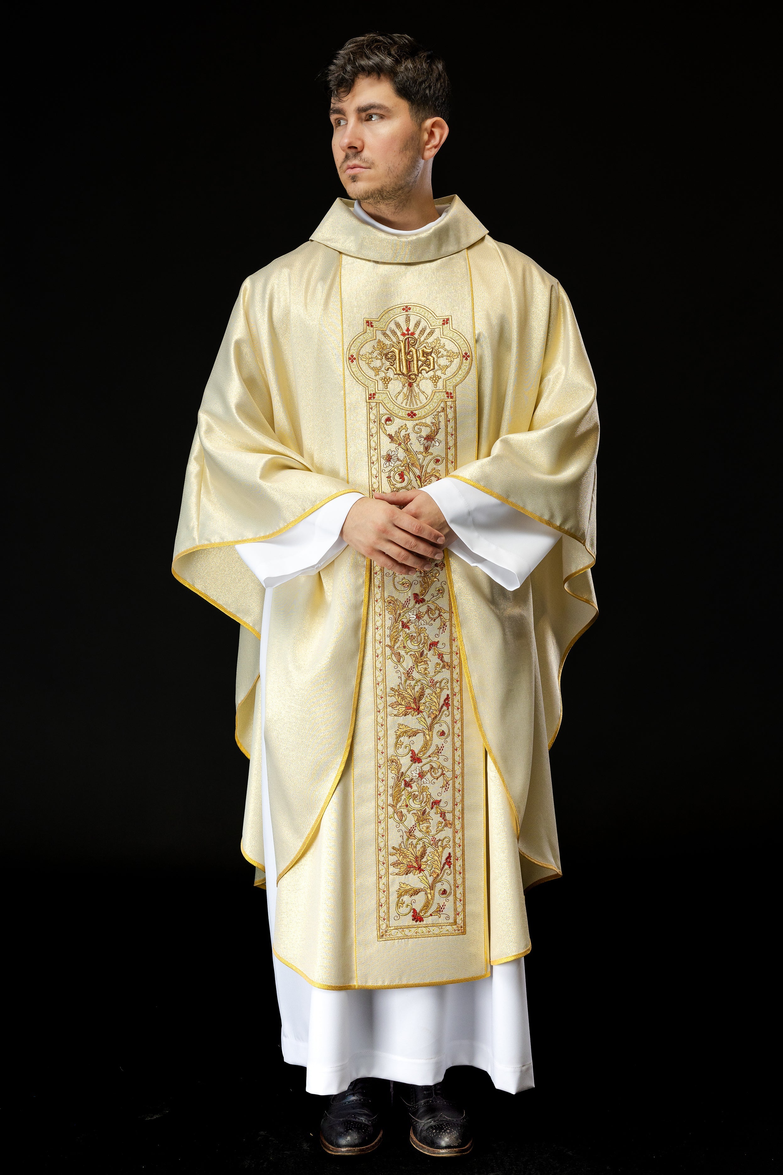 Chasuble richly decorated with IHS motif in gold color