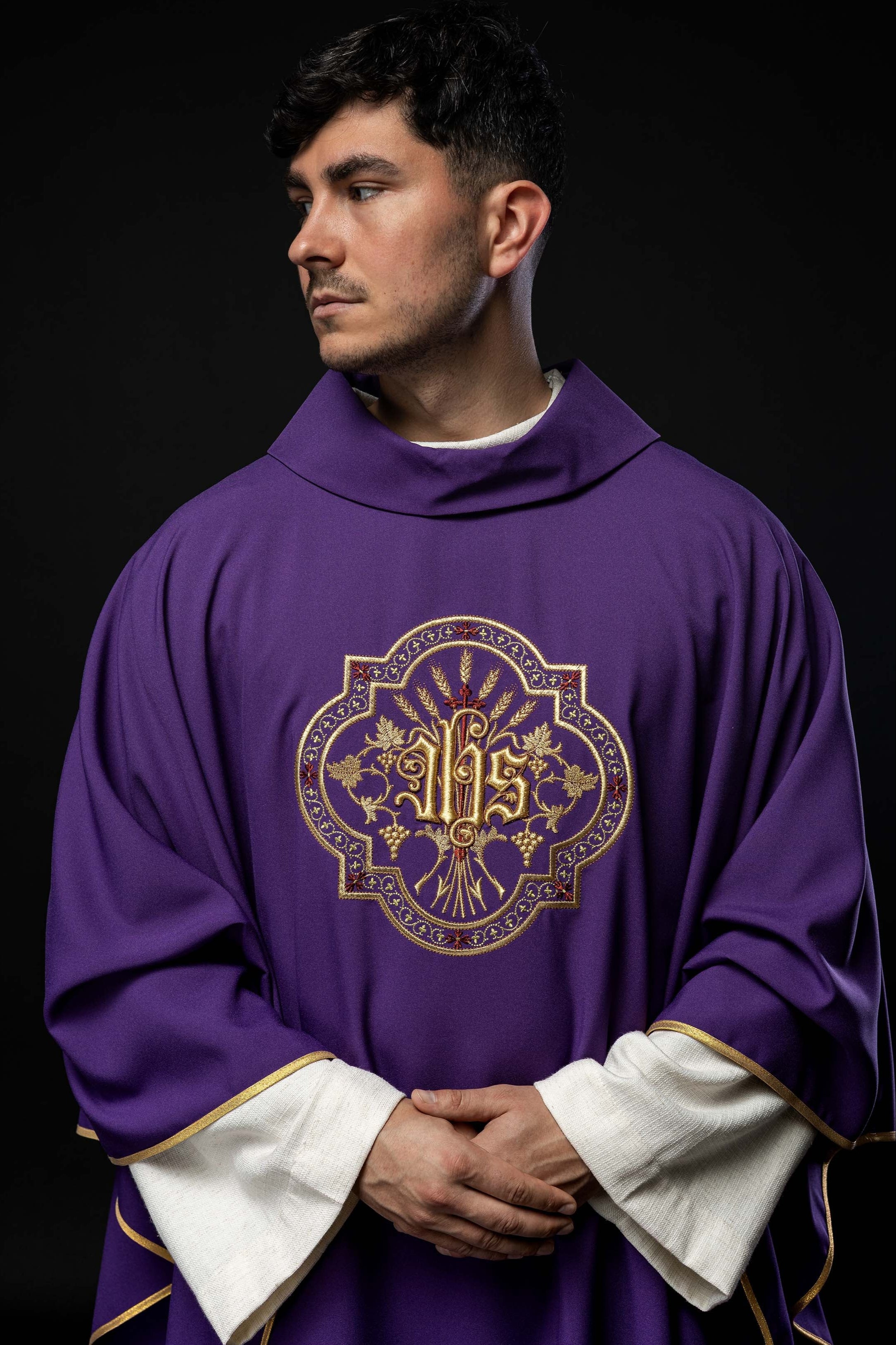 Purple chasuble with IHS and PAX embroidery