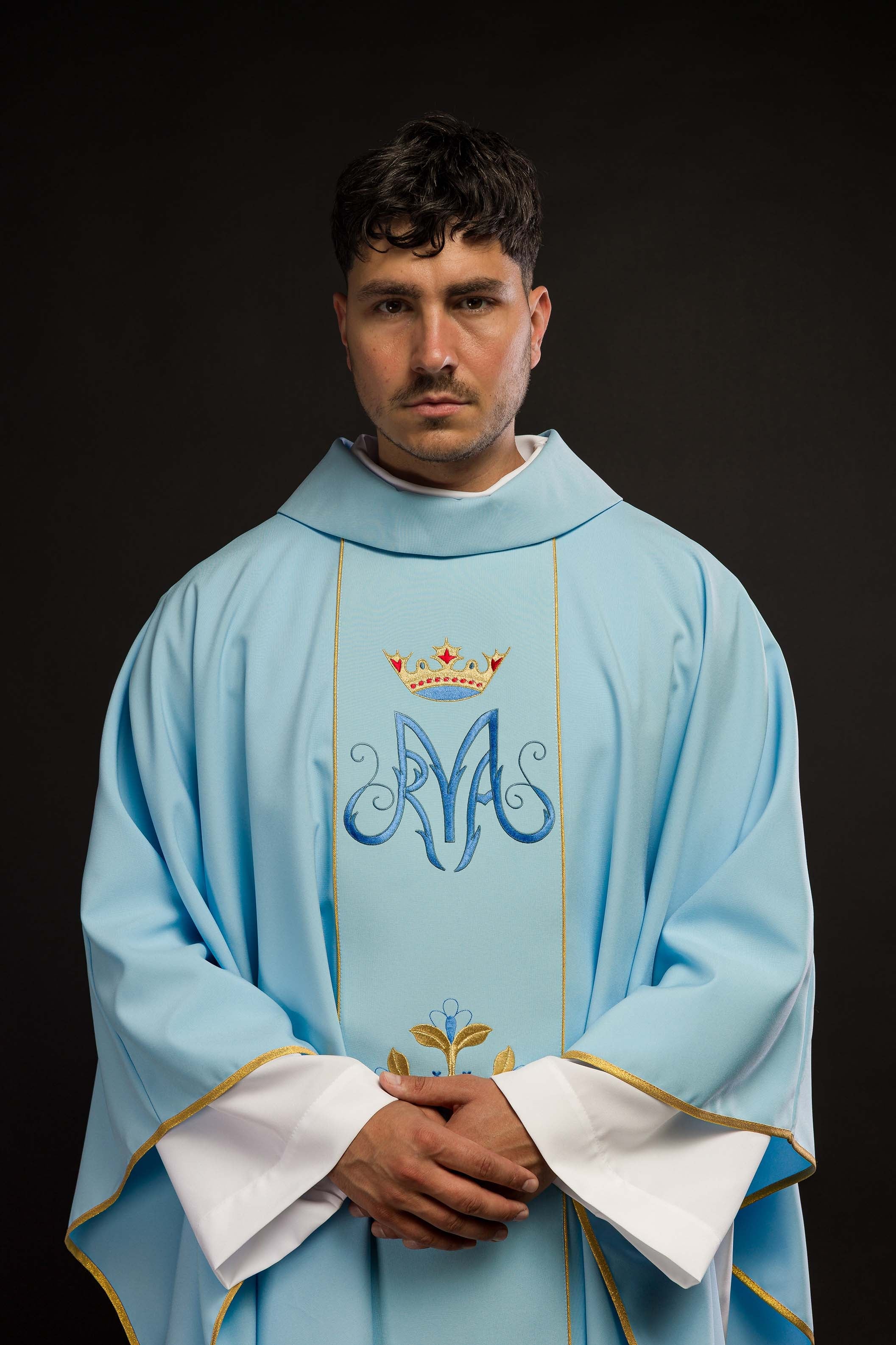 Blue liturgical chasuble with gold Marian embroidery