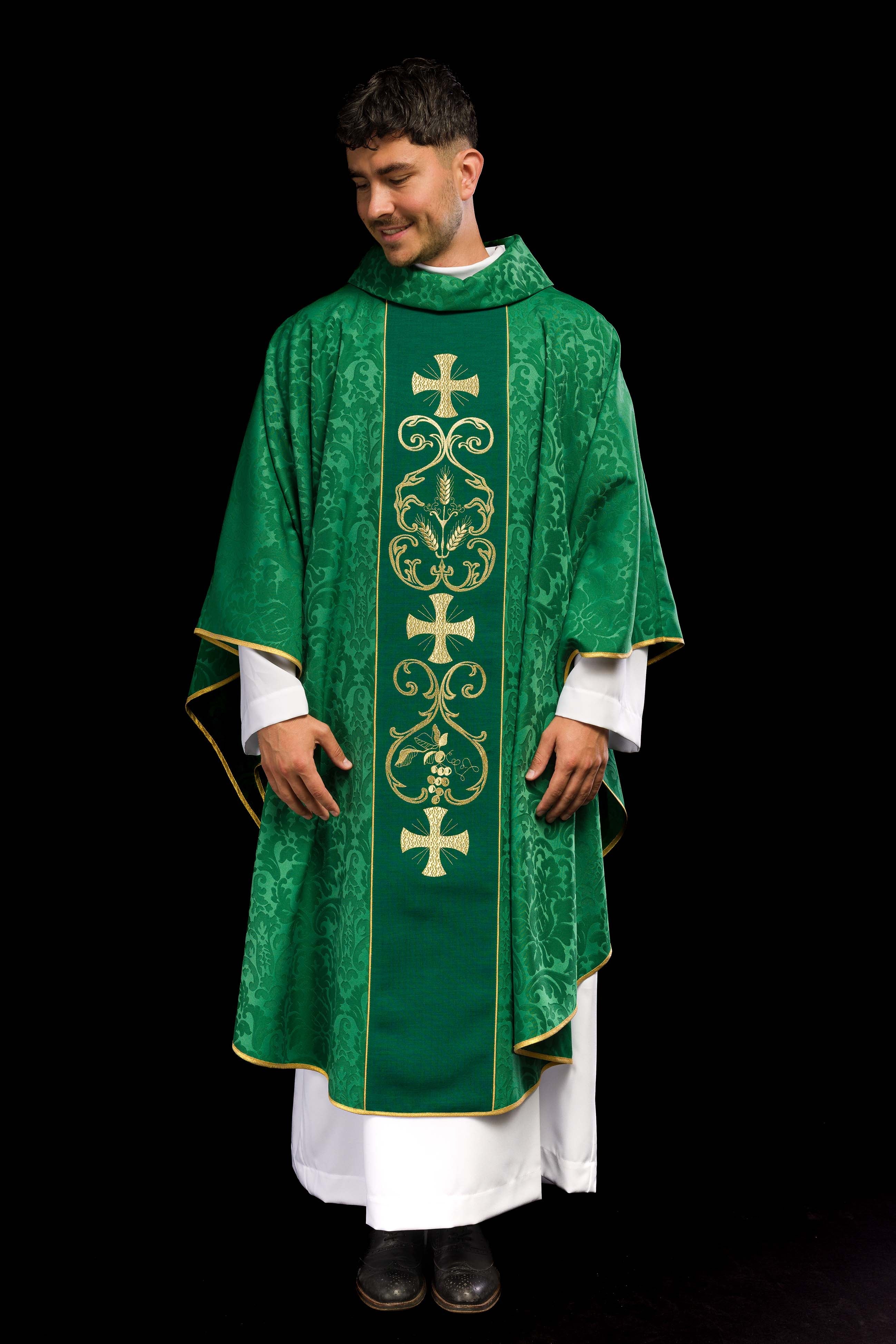 Green liturgical chasuble decorated with an embroidered belt