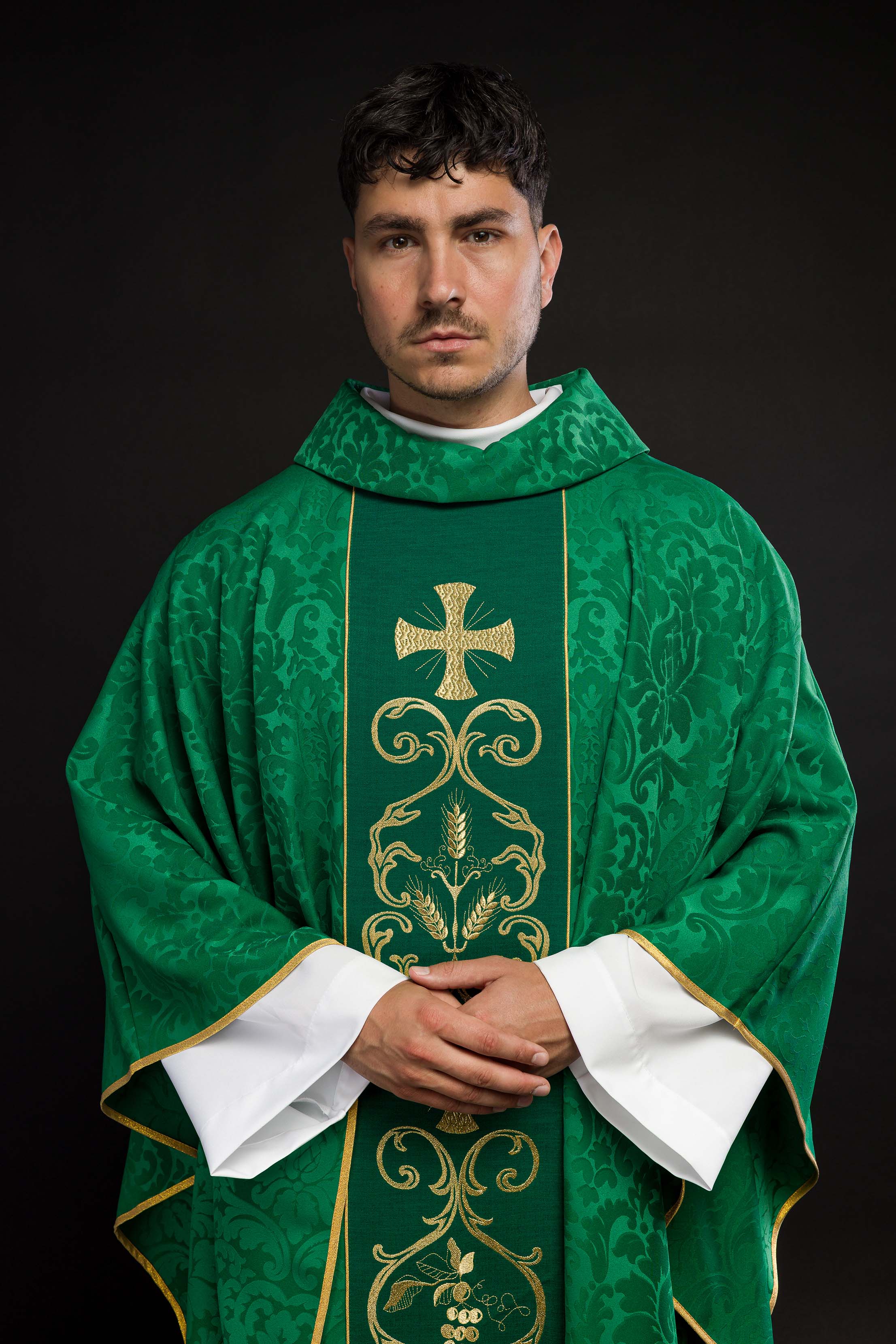 Green liturgical chasuble decorated with an embroidered belt