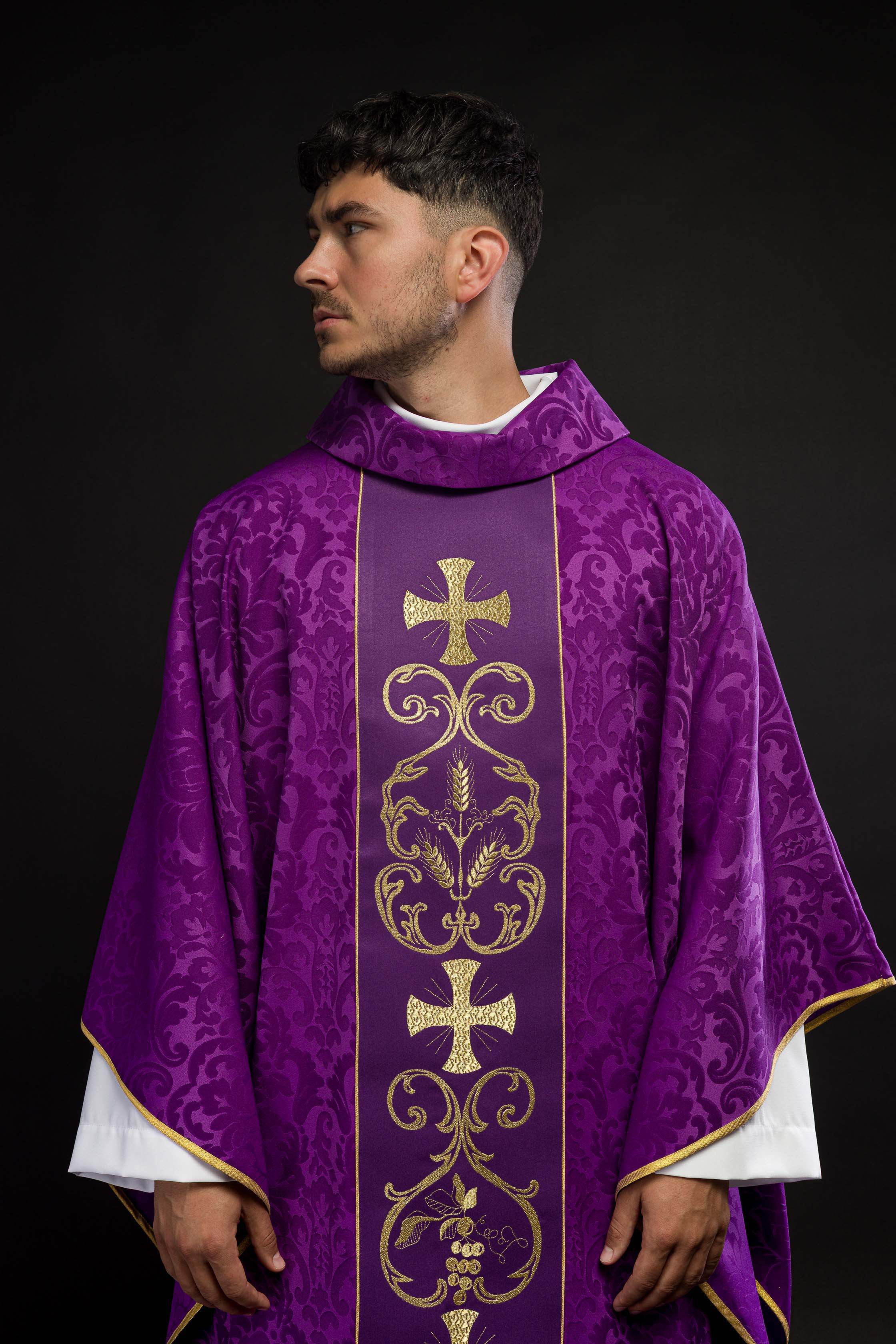 Purple liturgical chasuble decorated with an embroidered belt
