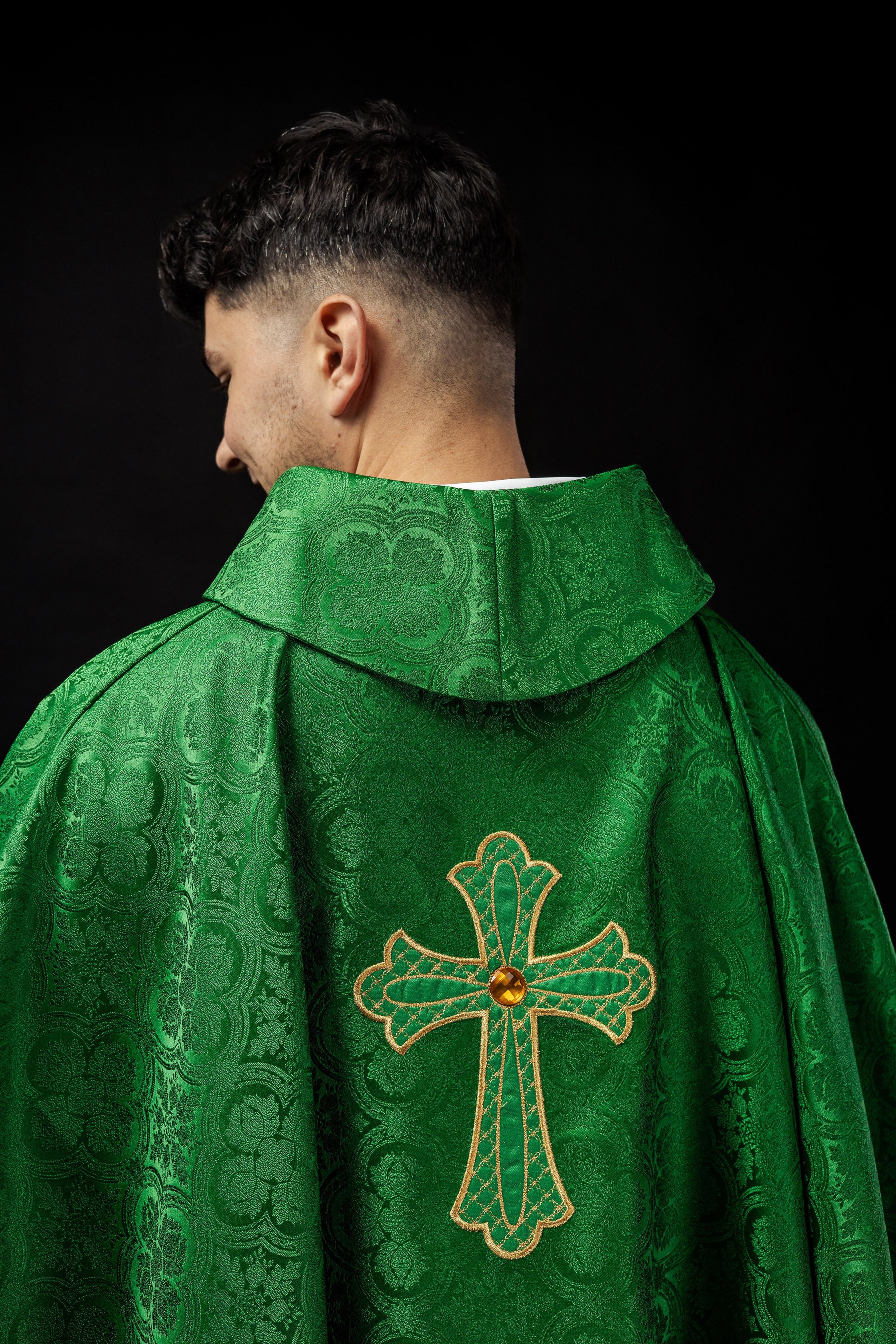 Green chasuble with gold cross