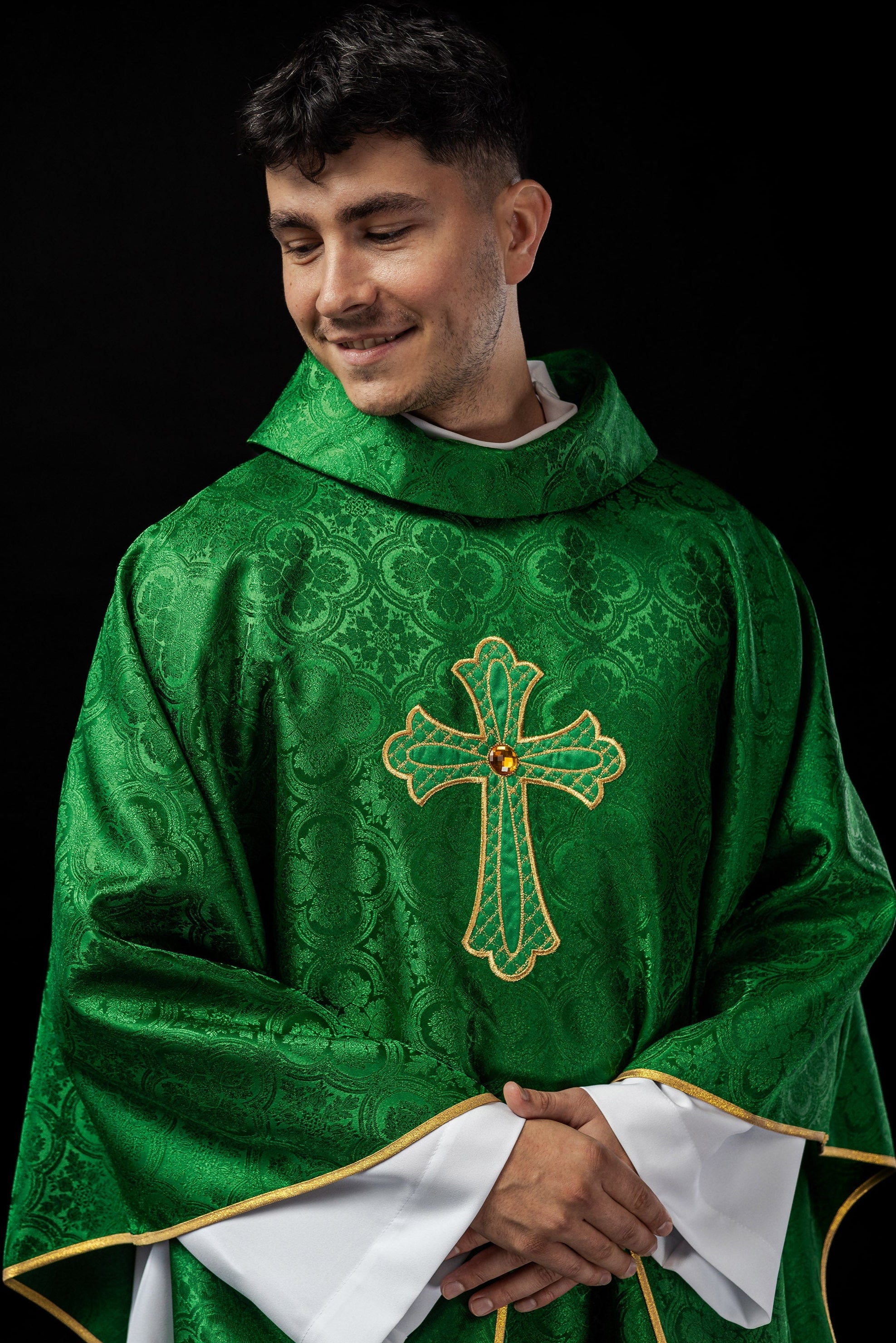 Green chasuble with gold cross