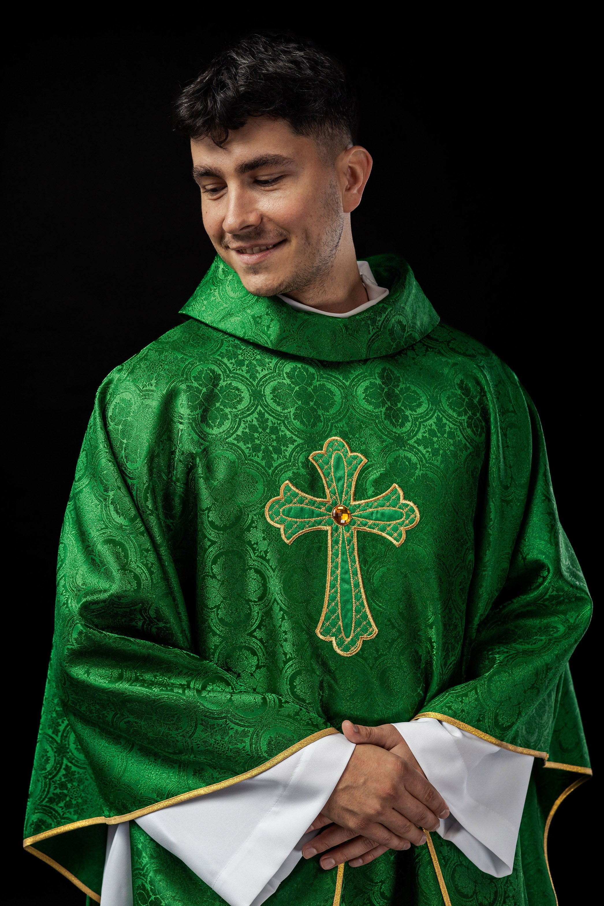 Green chasuble with gold cross