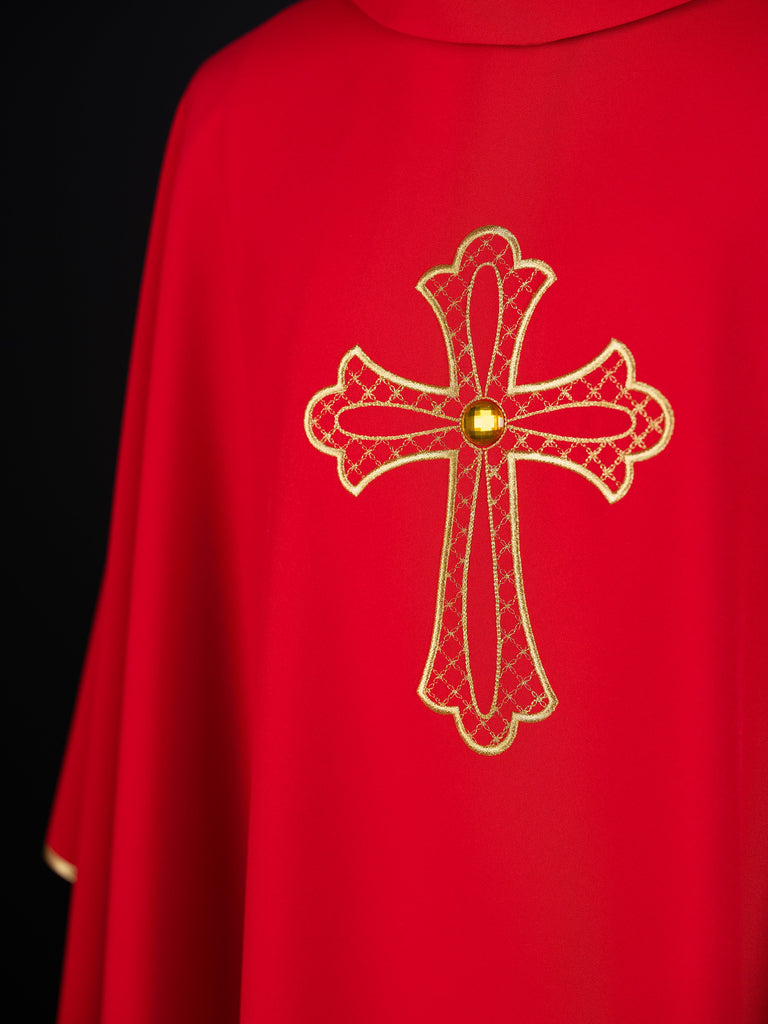 Red chasuble embroidered with the symbol of the cros