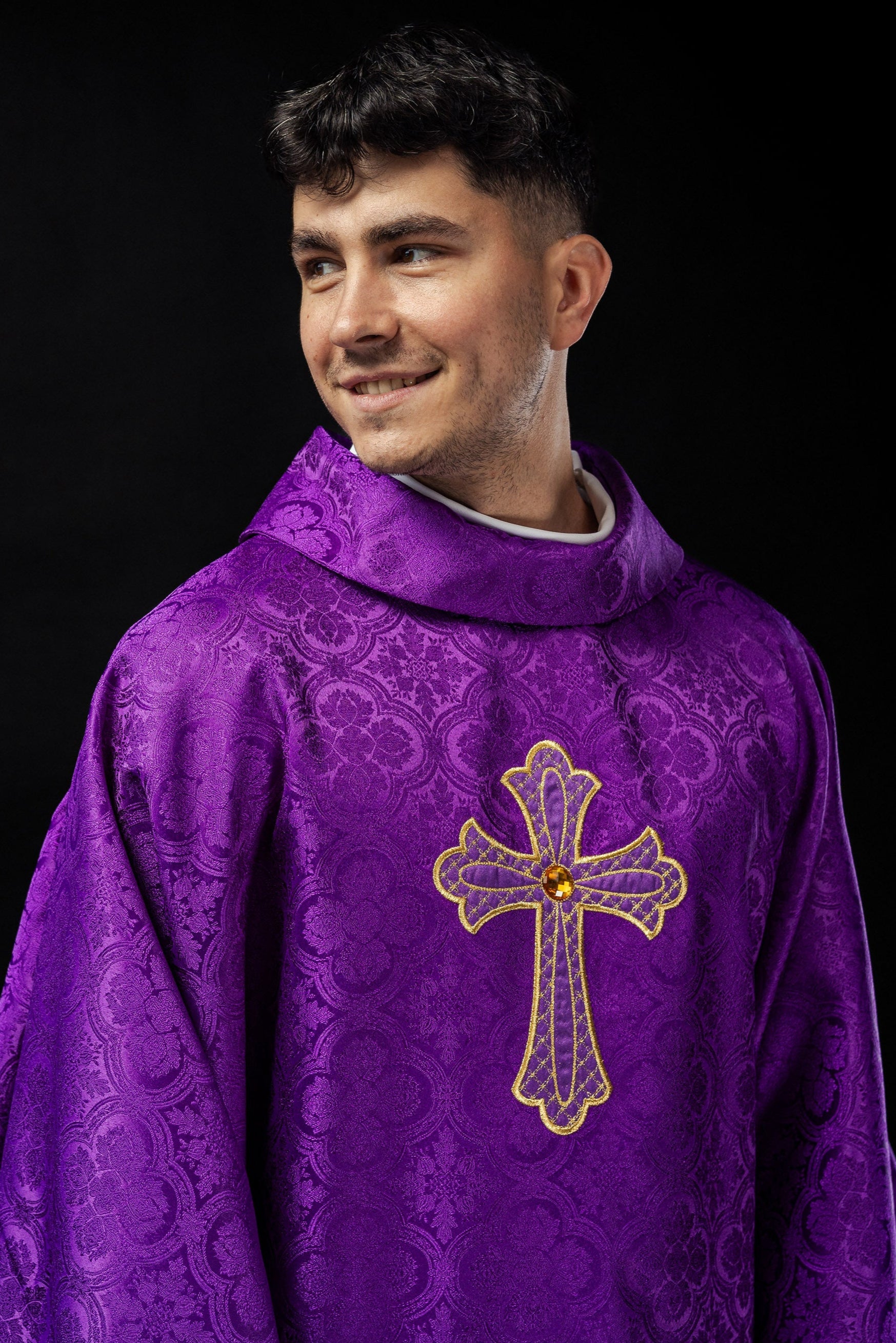 Purple chasuble with gold cross