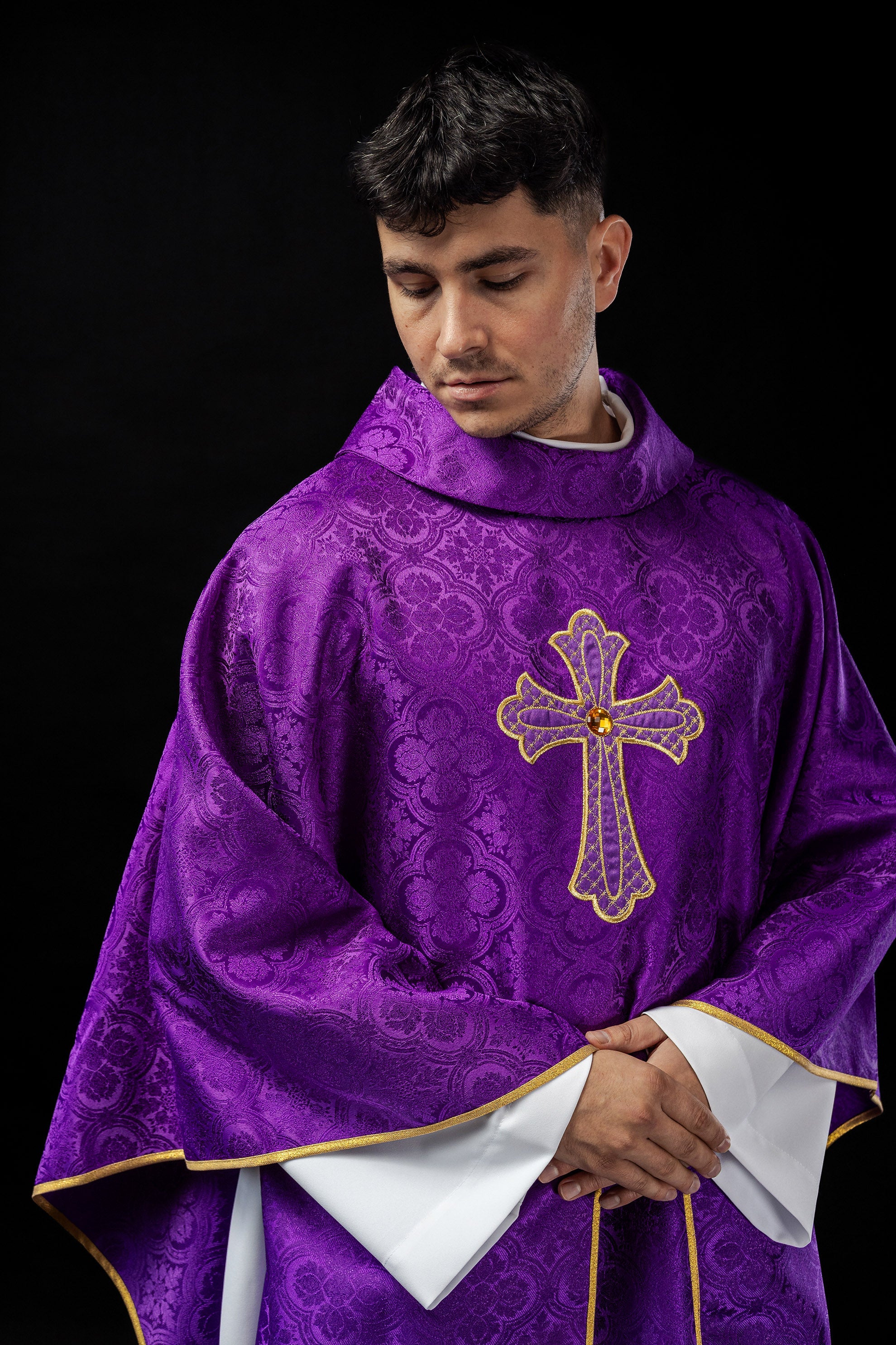 Purple chasuble with gold cross