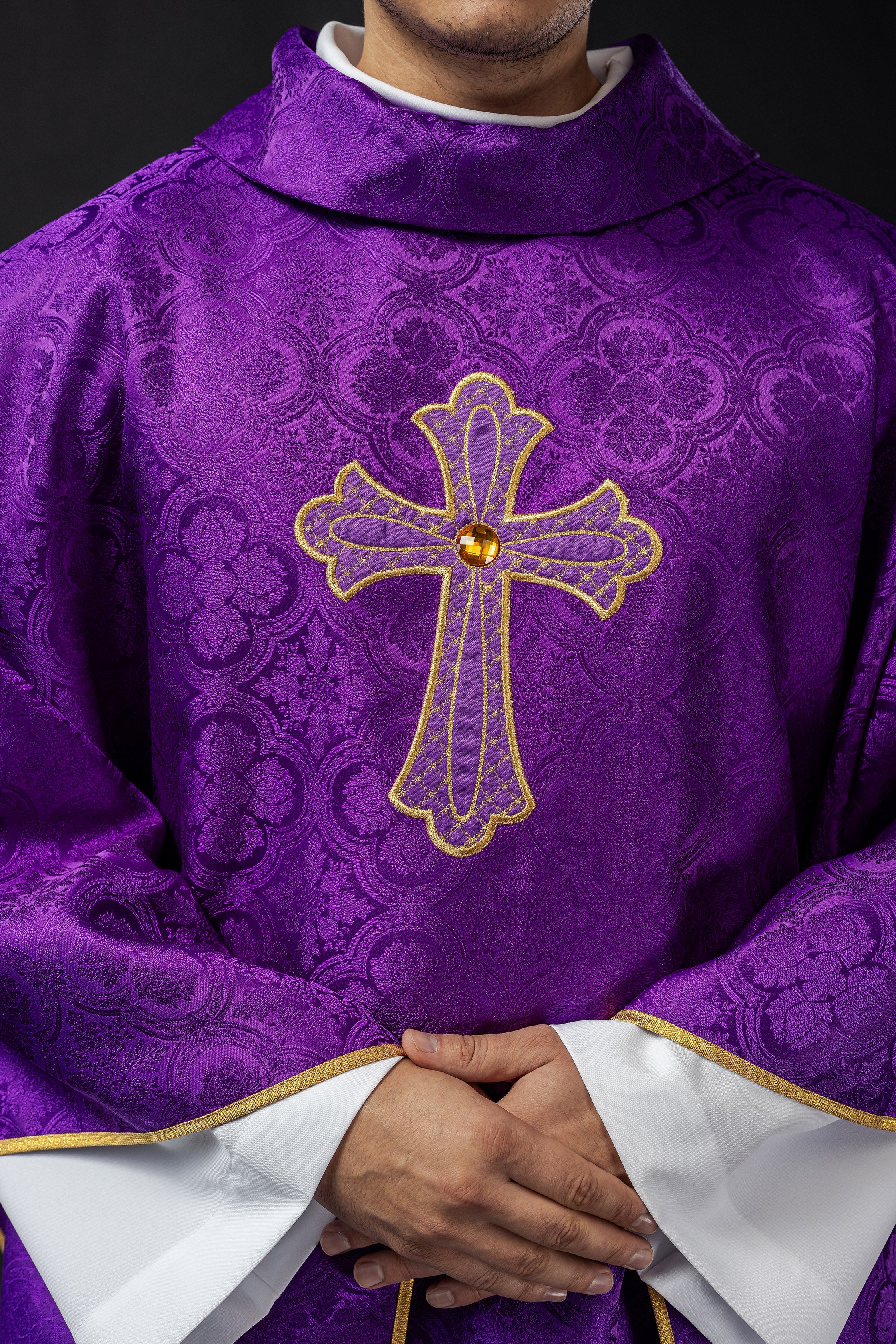 Purple chasuble with gold cross