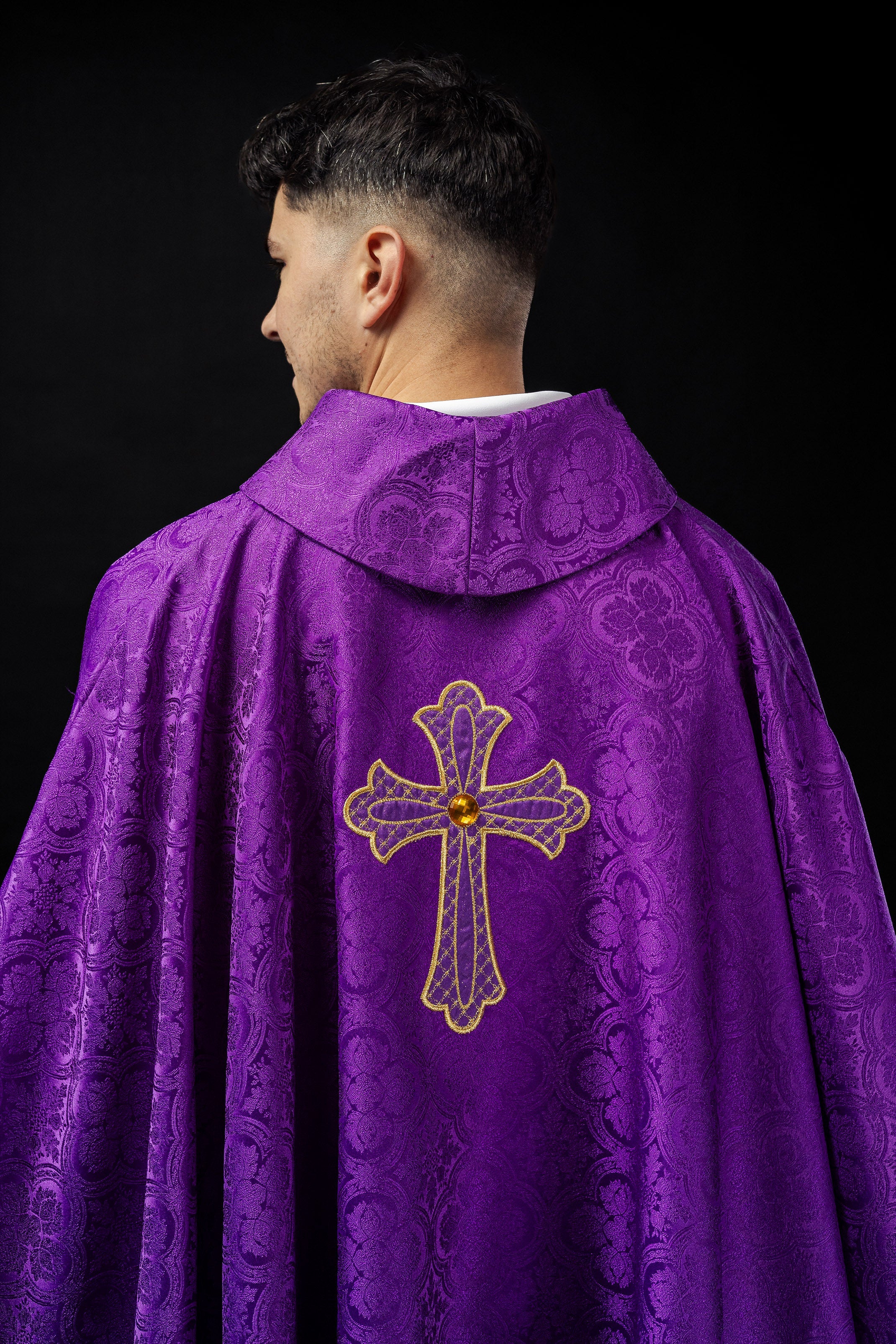 Purple chasuble with gold cross