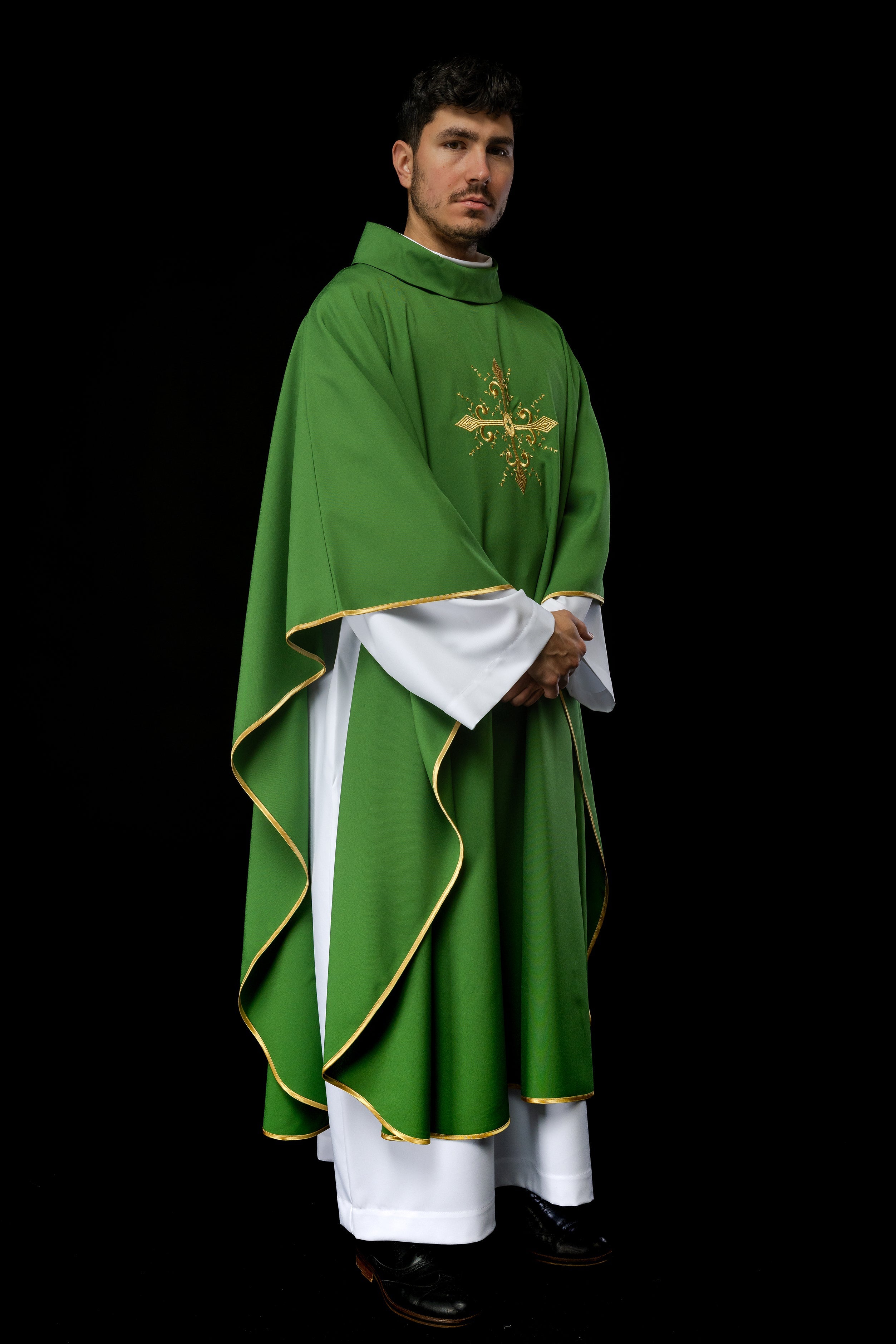 Green chasuble with gold cross motif