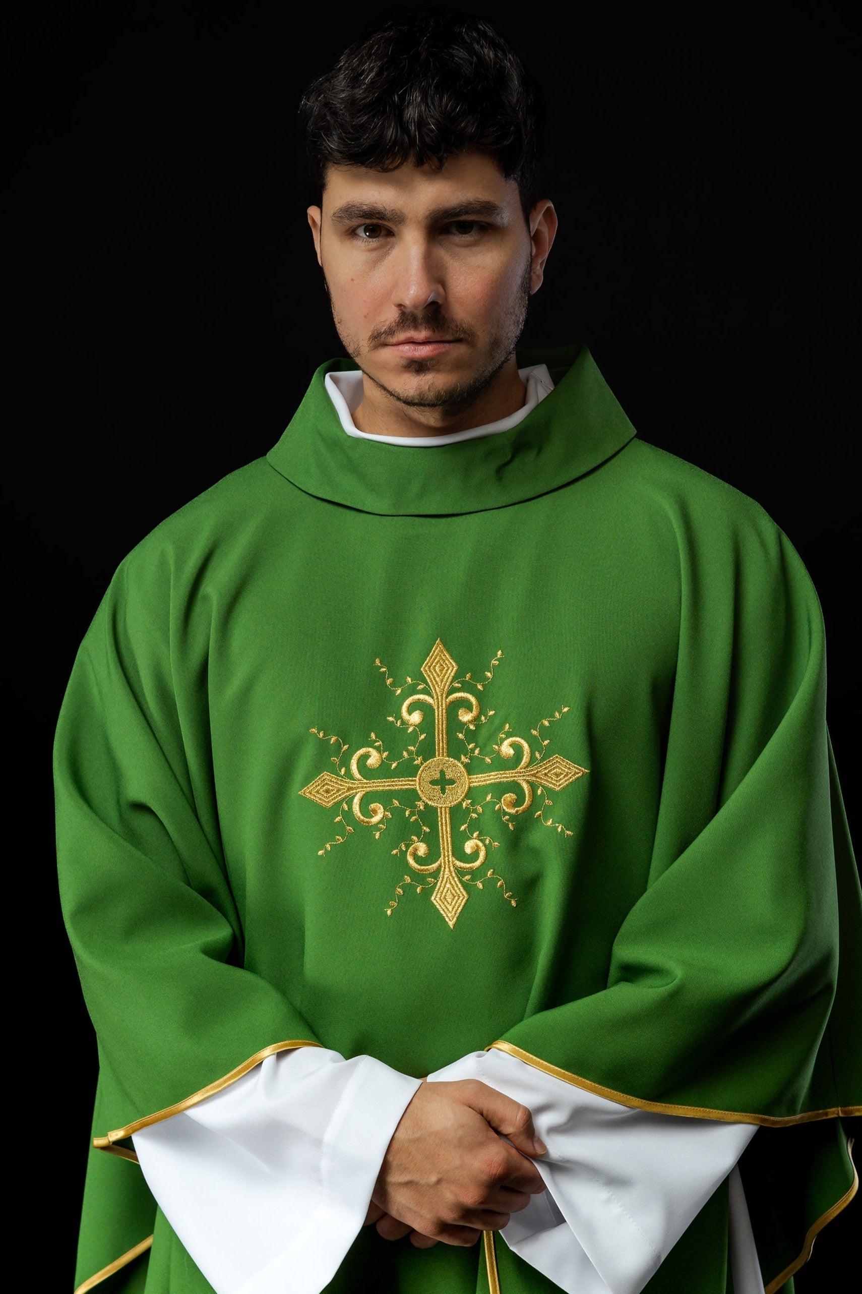 Green chasuble with gold cross motif