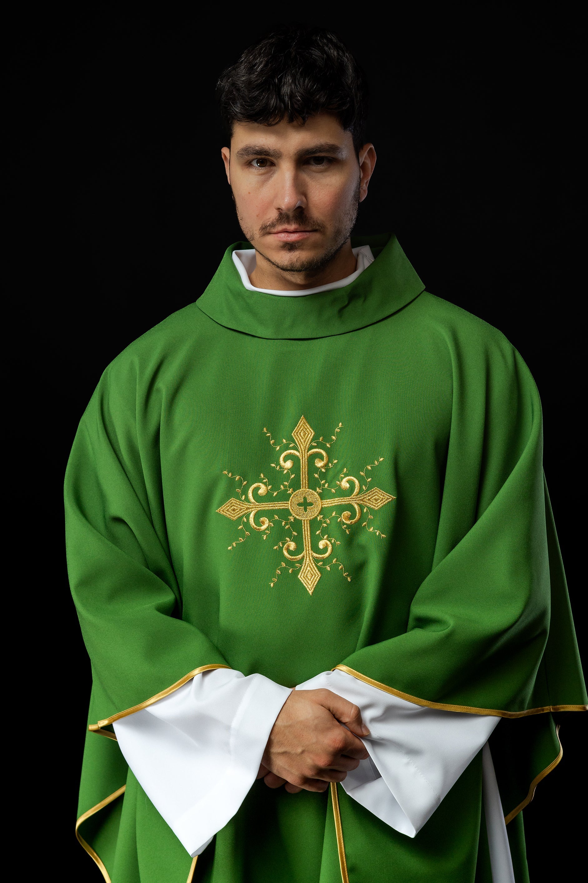 Green chasuble with gold cross motif