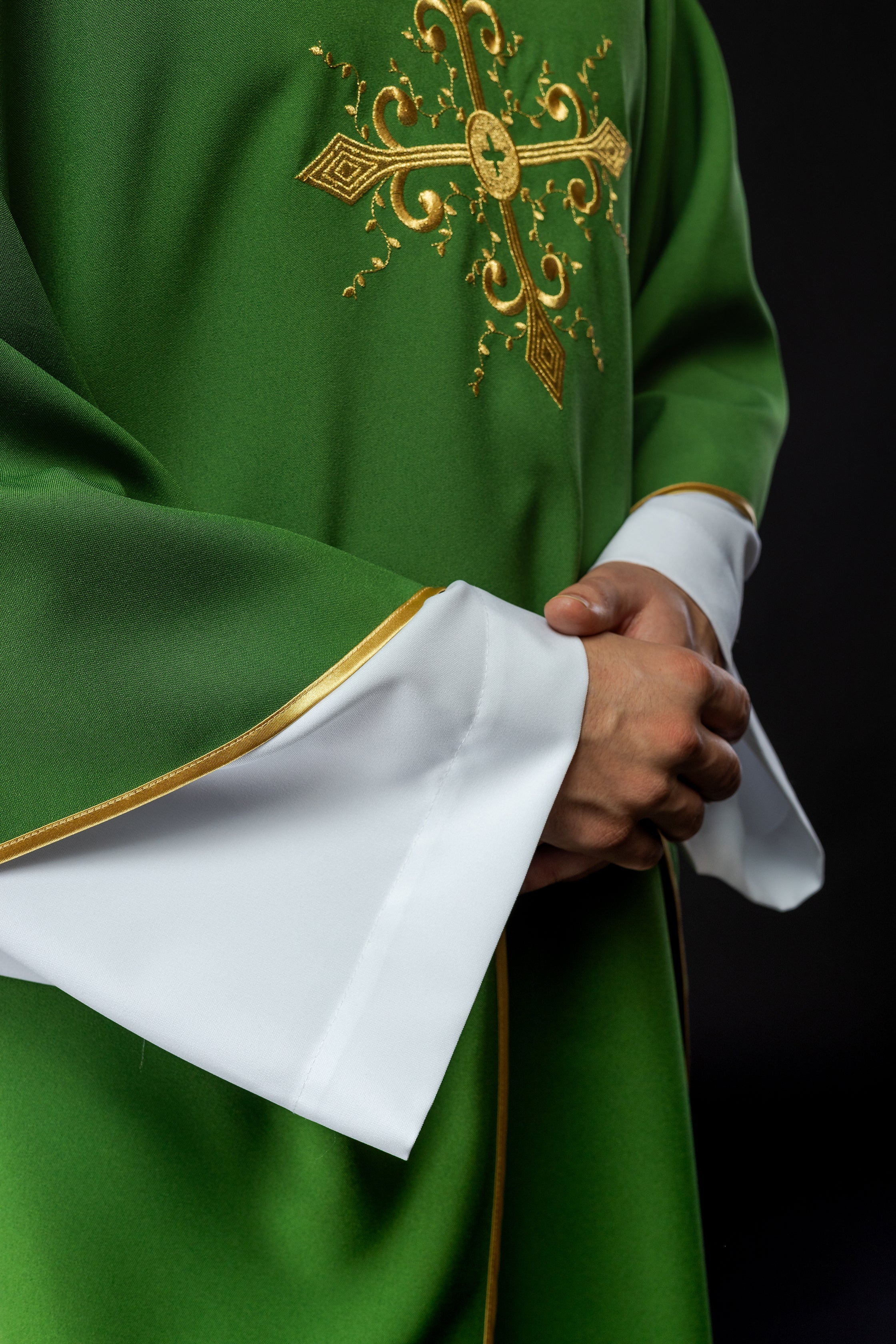 Green chasuble with gold cross motif