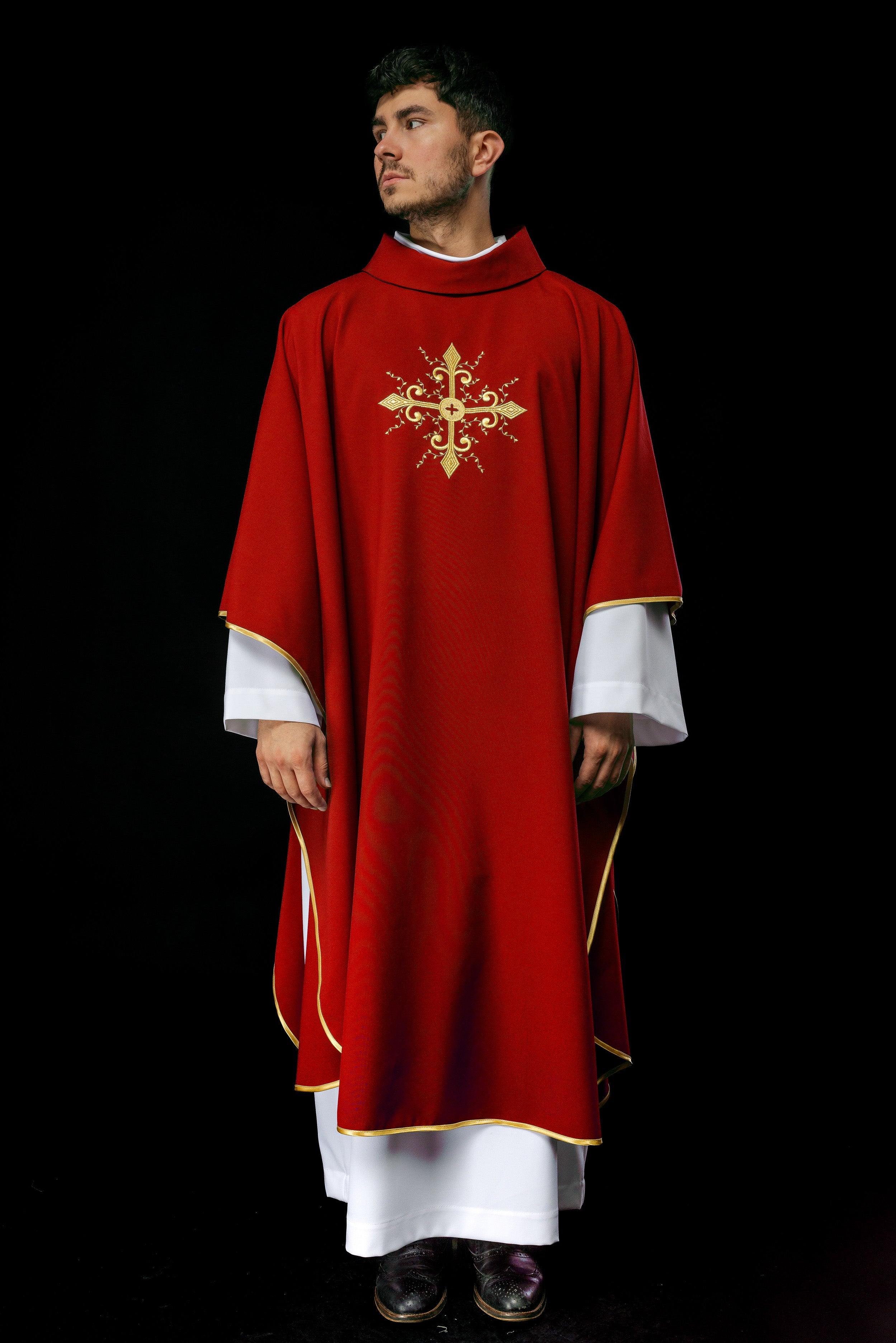 Red chasuble embroidered with cross motif