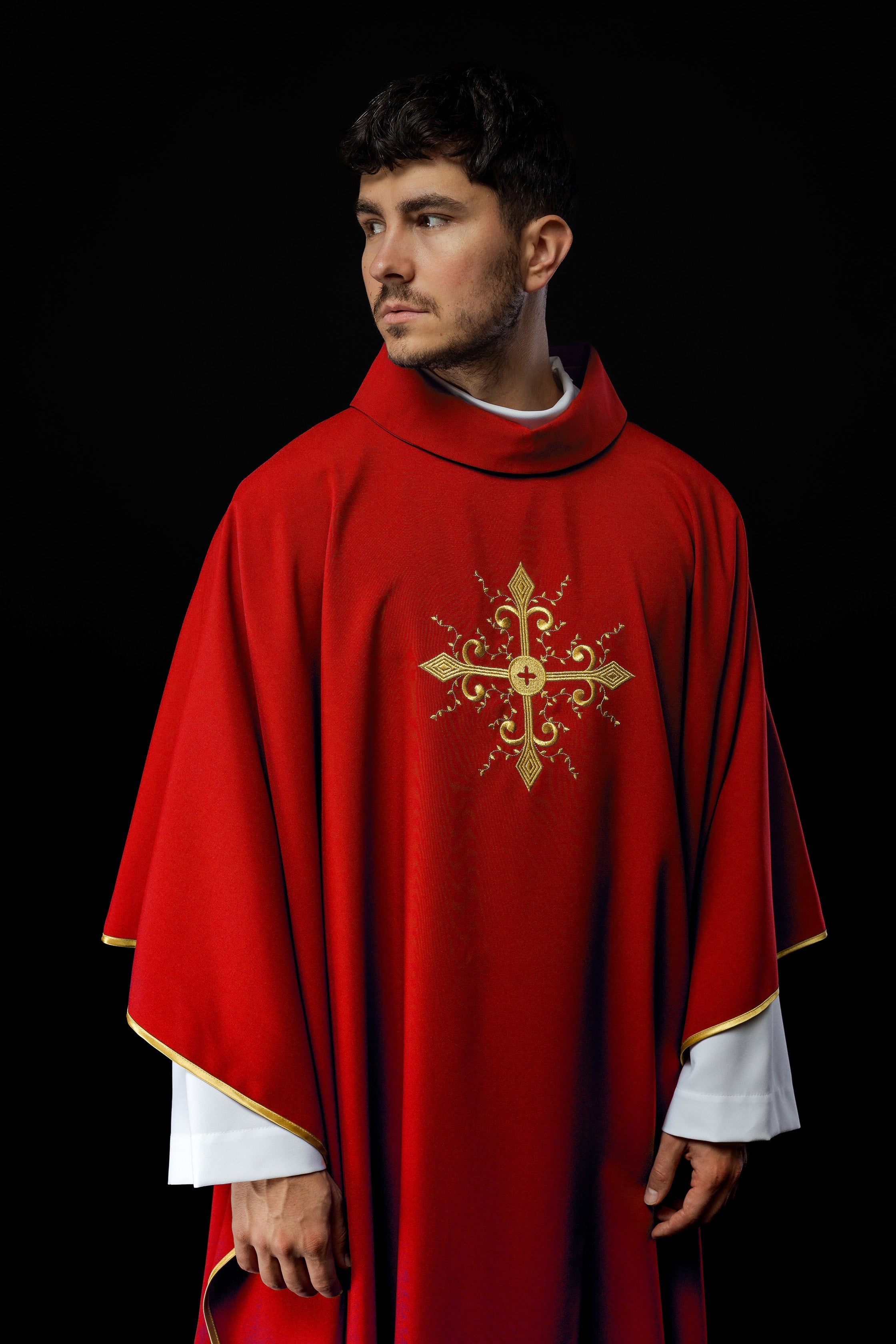 Red chasuble embroidered with cross motif