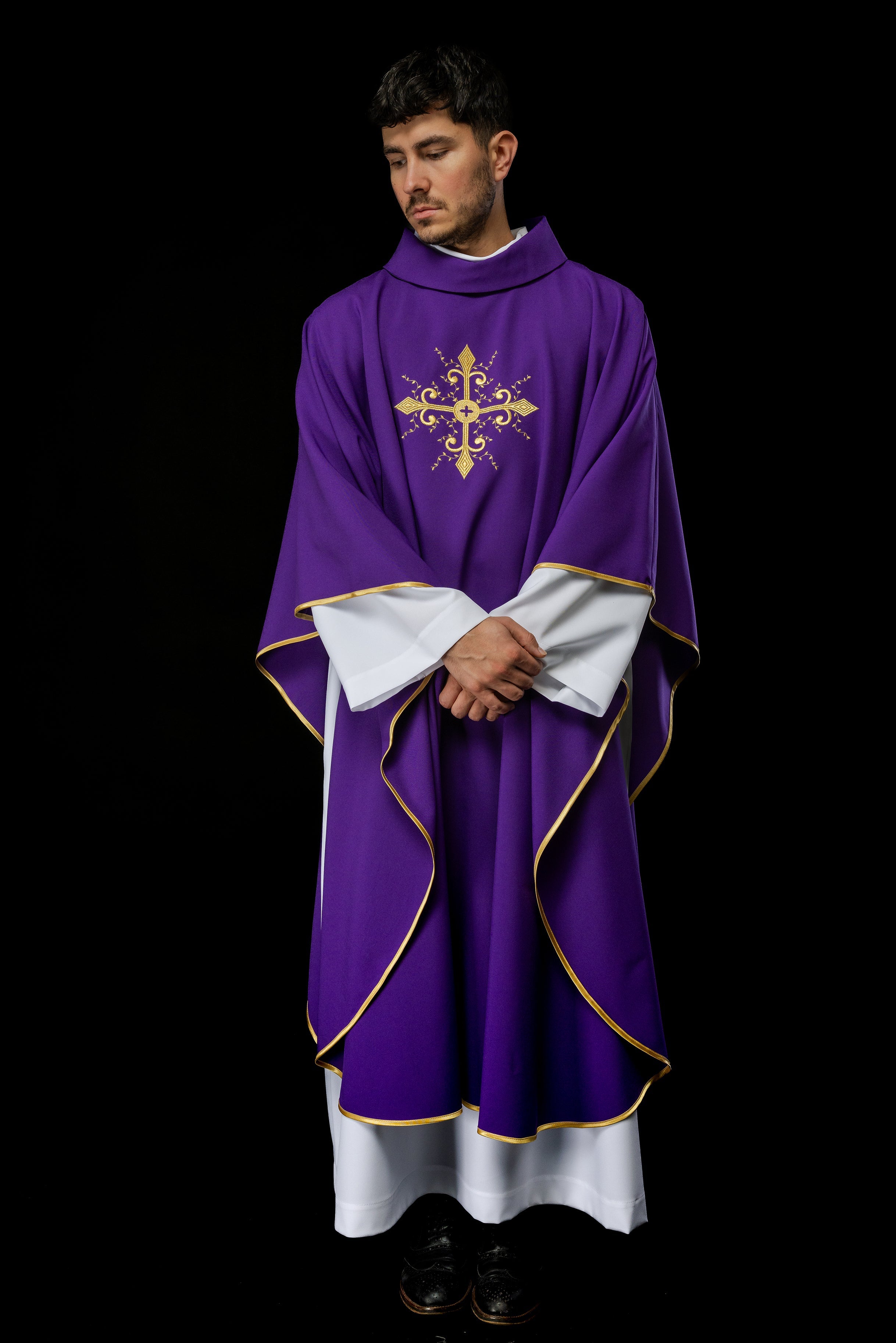 Purple chasuble with gold cross motif