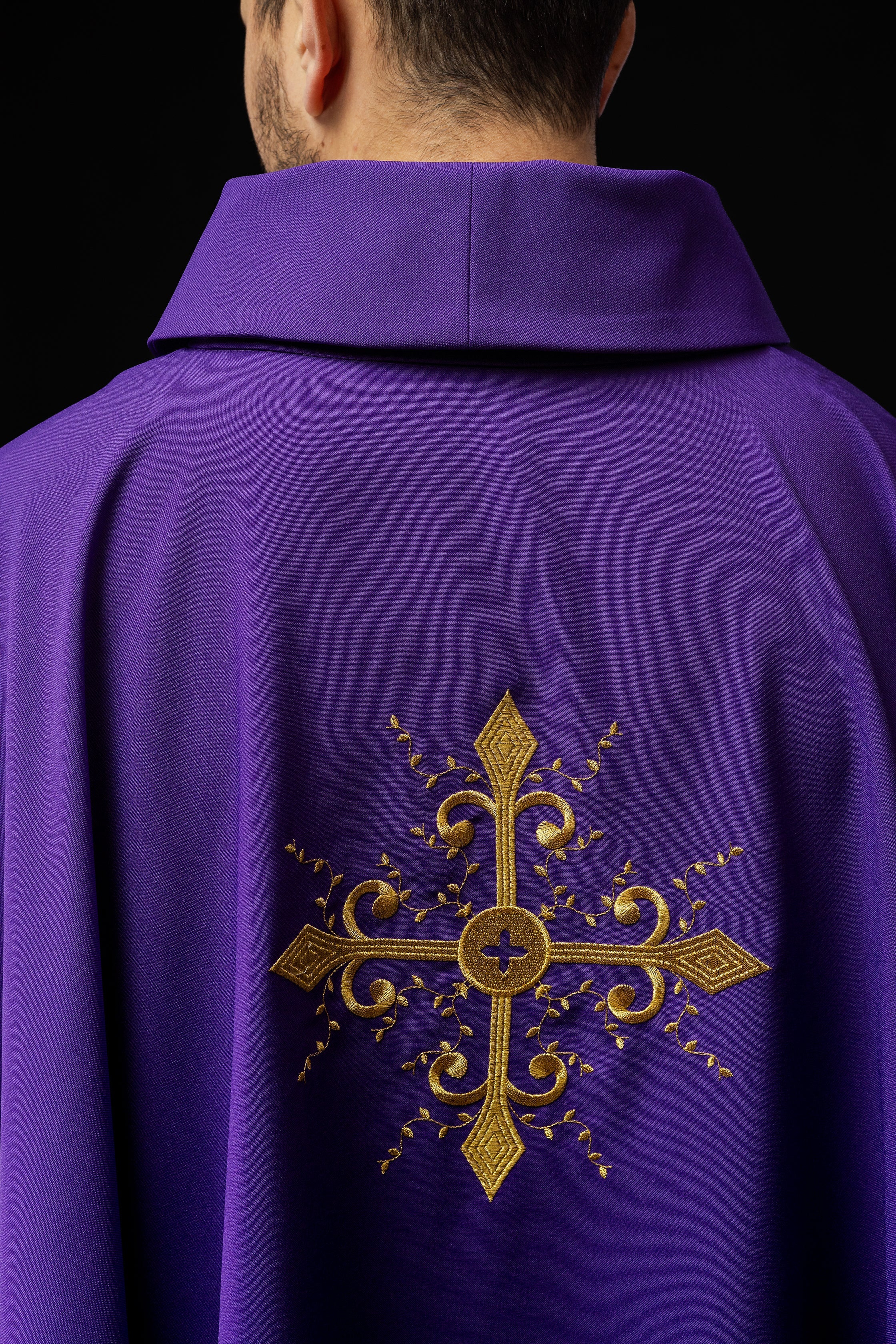 Purple chasuble with gold cross motif