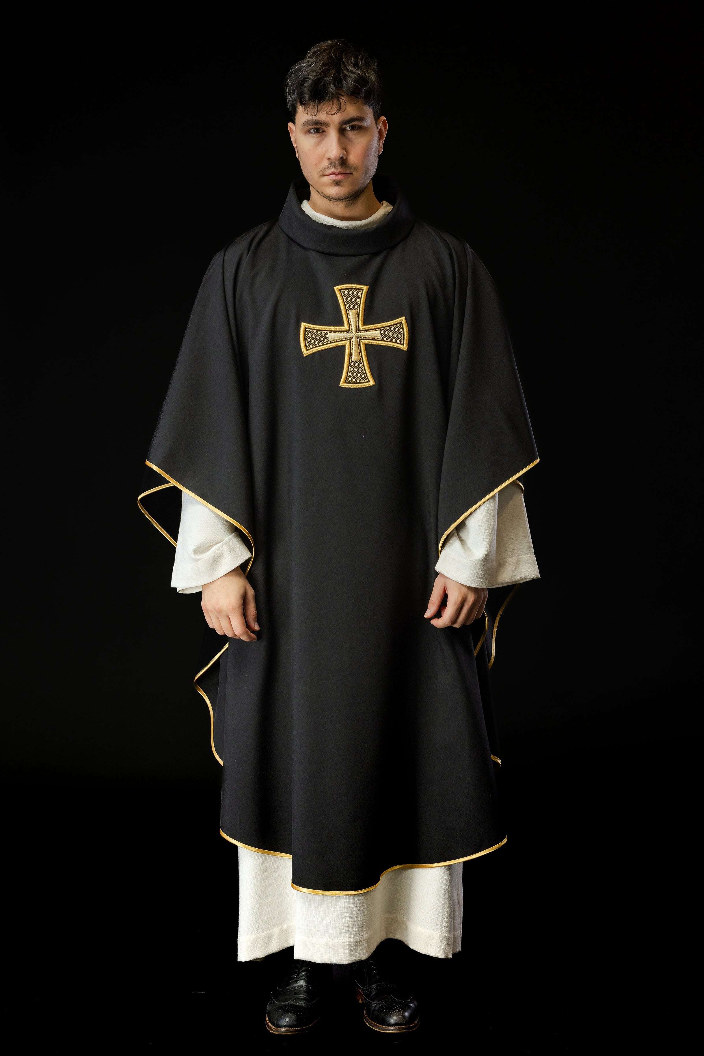 Black chasuble with gold cross