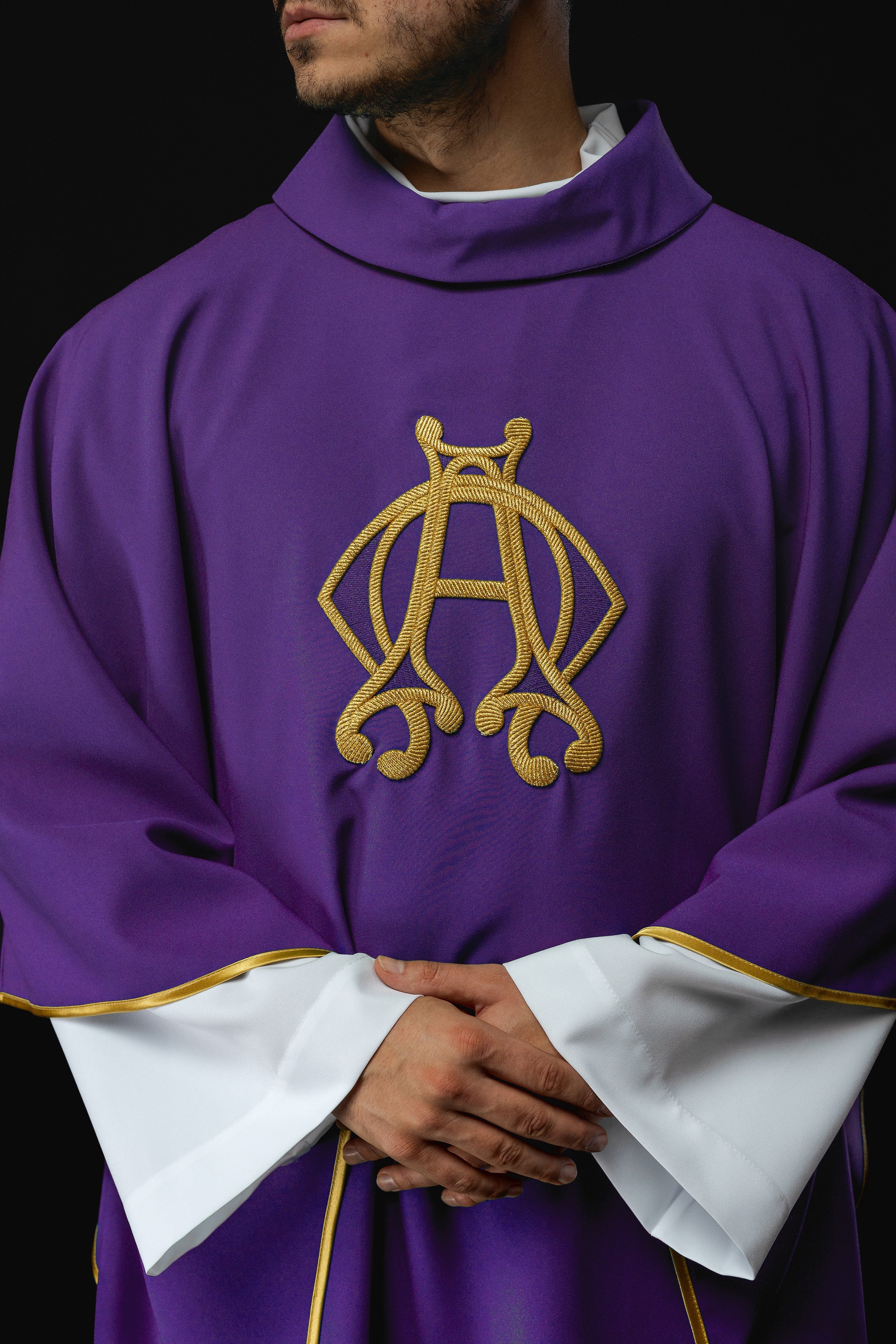 Purple chasuble with Alfa and Omega embroidery