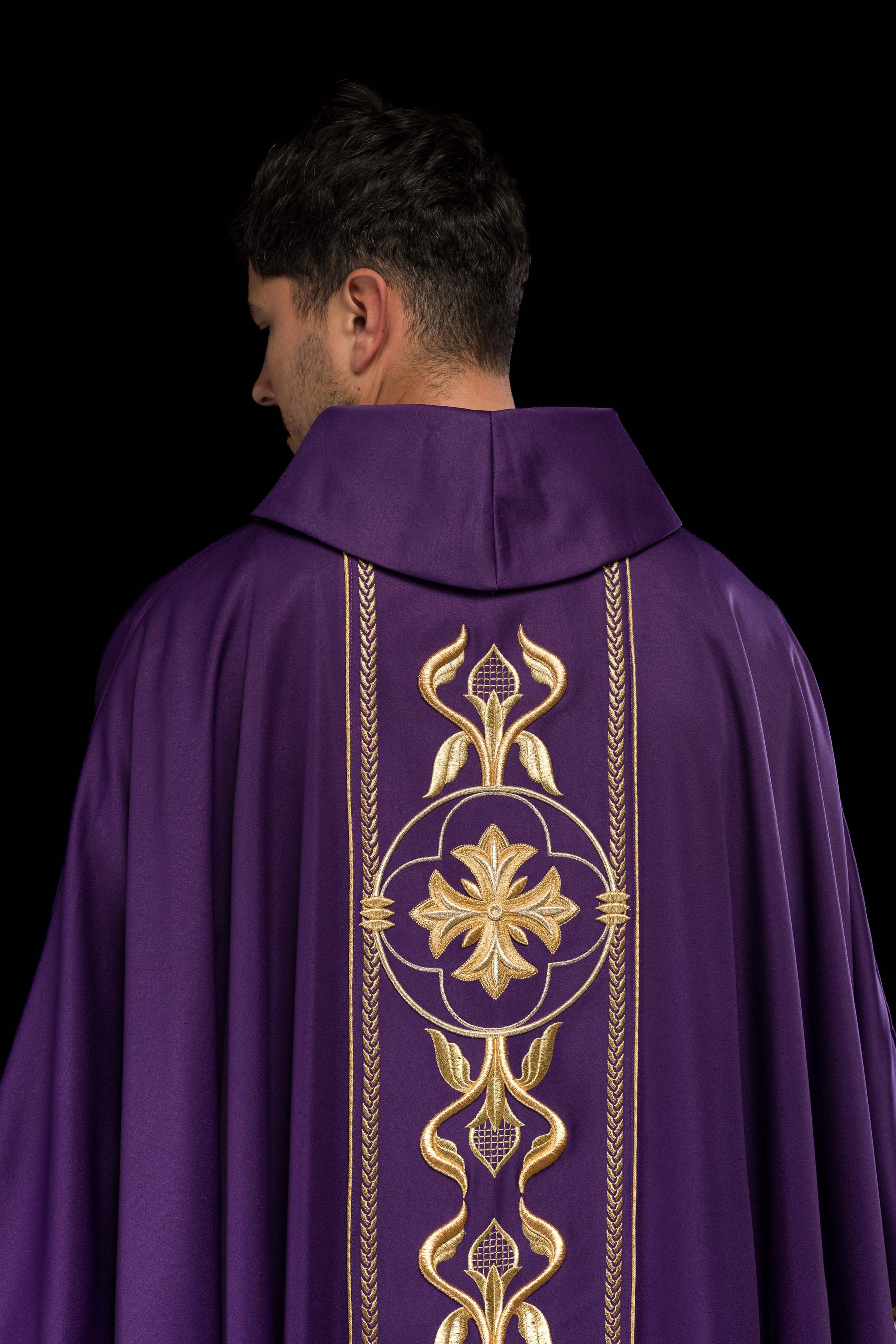Embroidered purple chasuble with decorative band