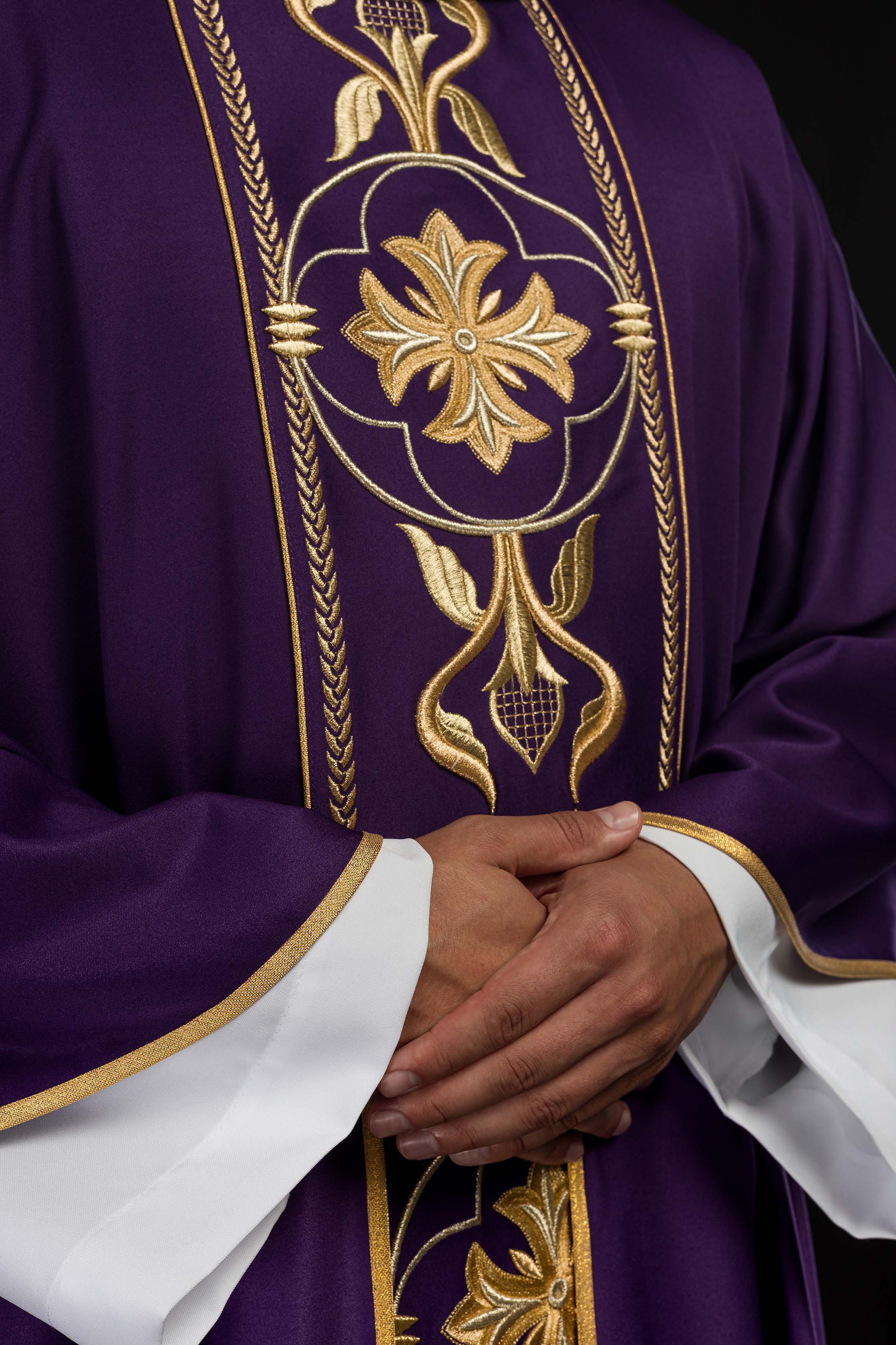 Embroidered purple chasuble with decorative band