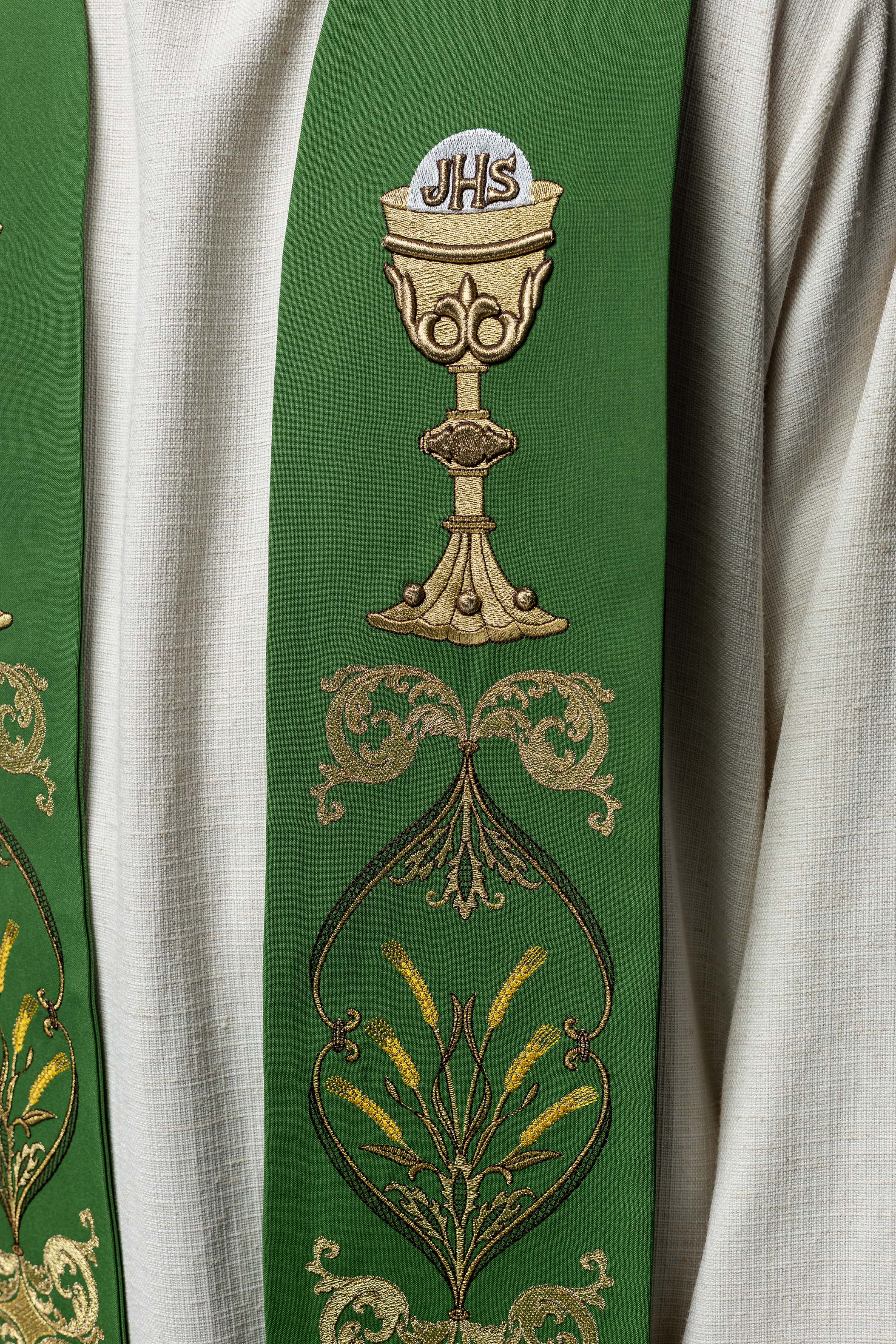 Green priestly stole with IHS chalice