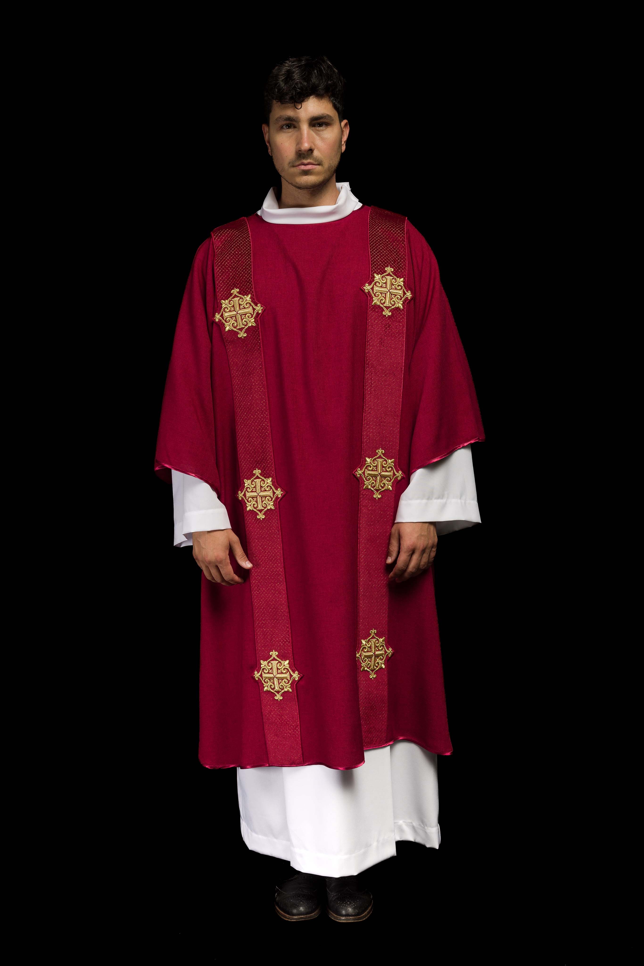Red dalmatic with velvet bands and cross symbols
