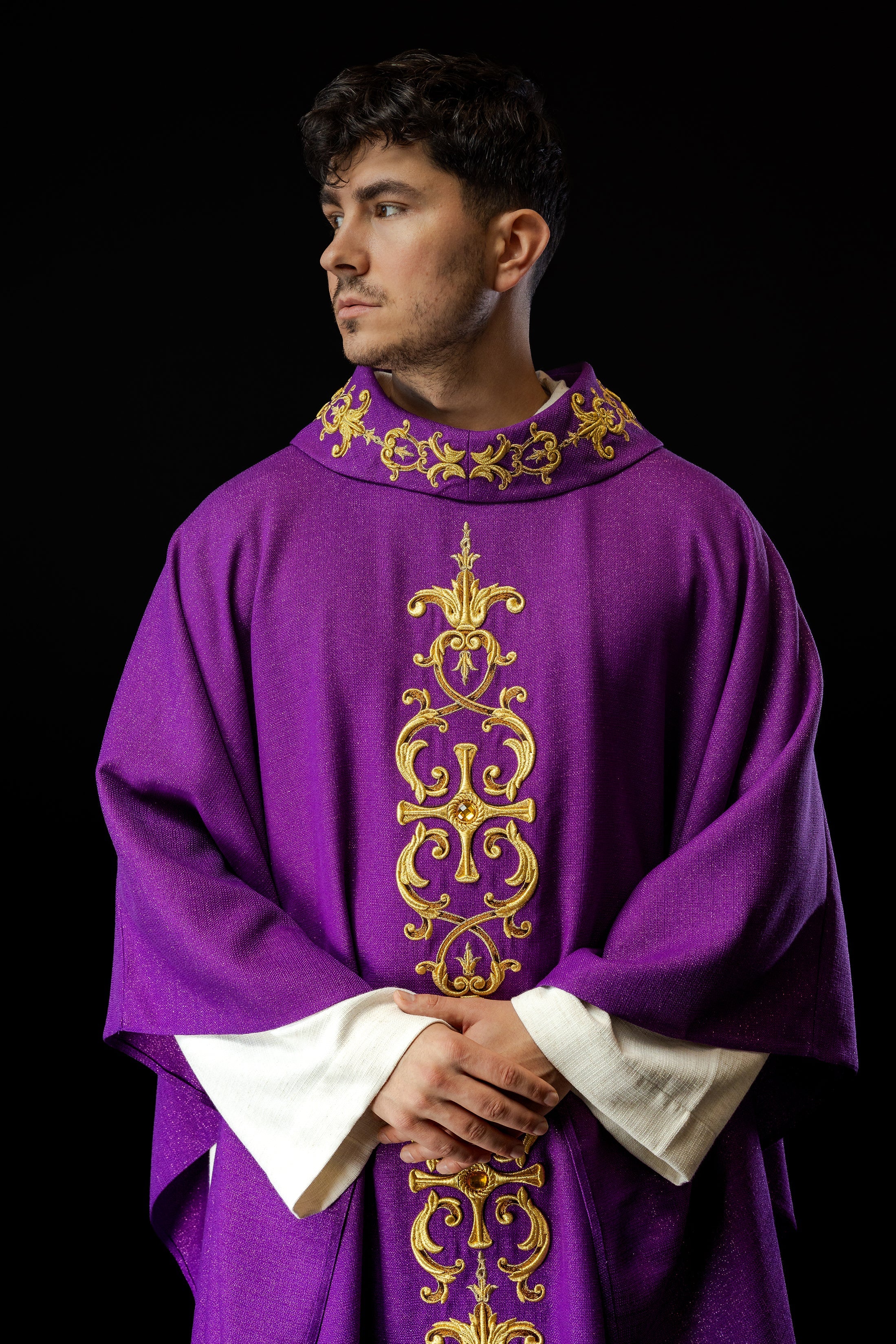 Purple chasuble richly embroidered with gemstones