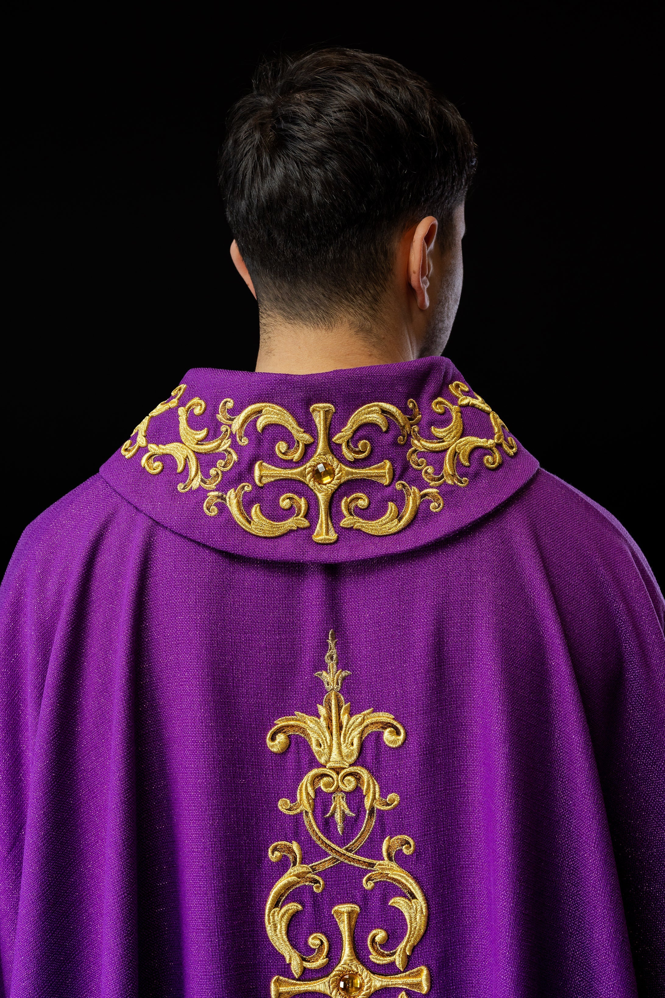 Purple chasuble richly embroidered with gemstones