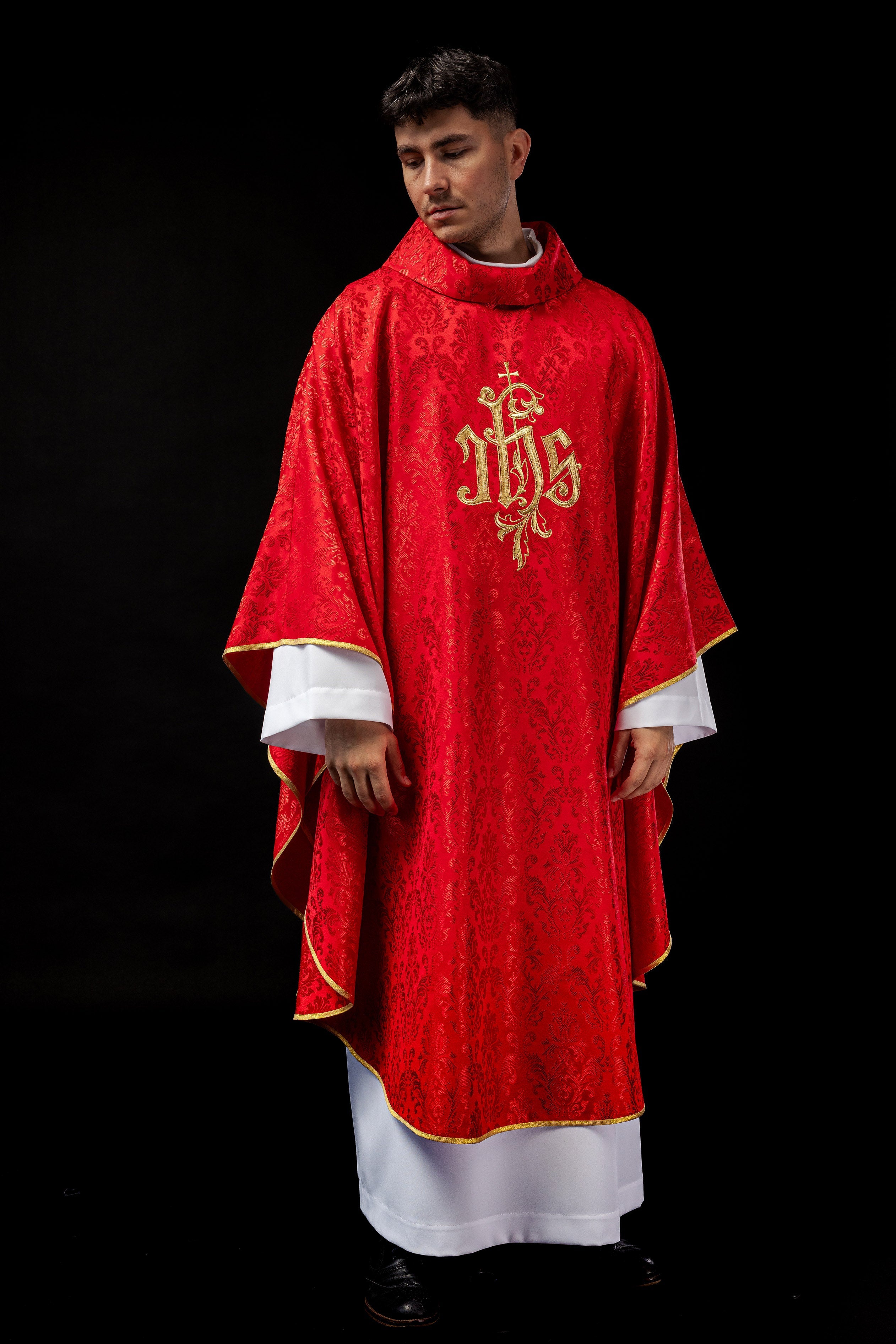 Red chasuble made of floral texture with classic IHS