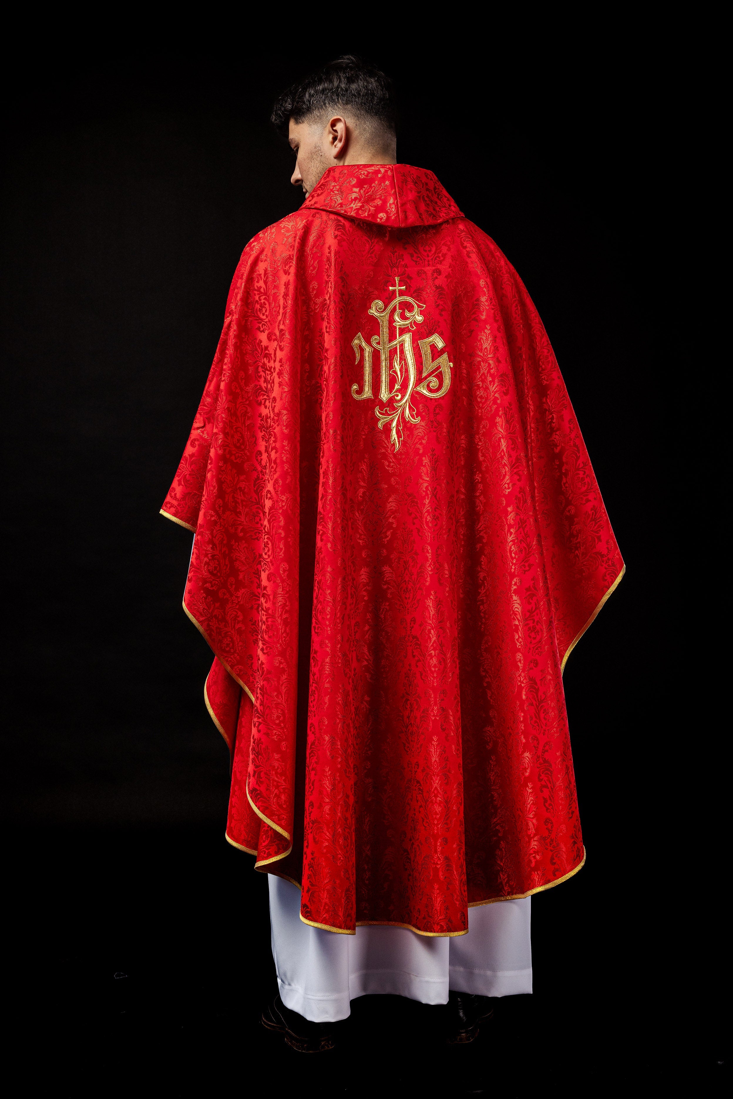 Red chasuble made of floral texture with classic IHS