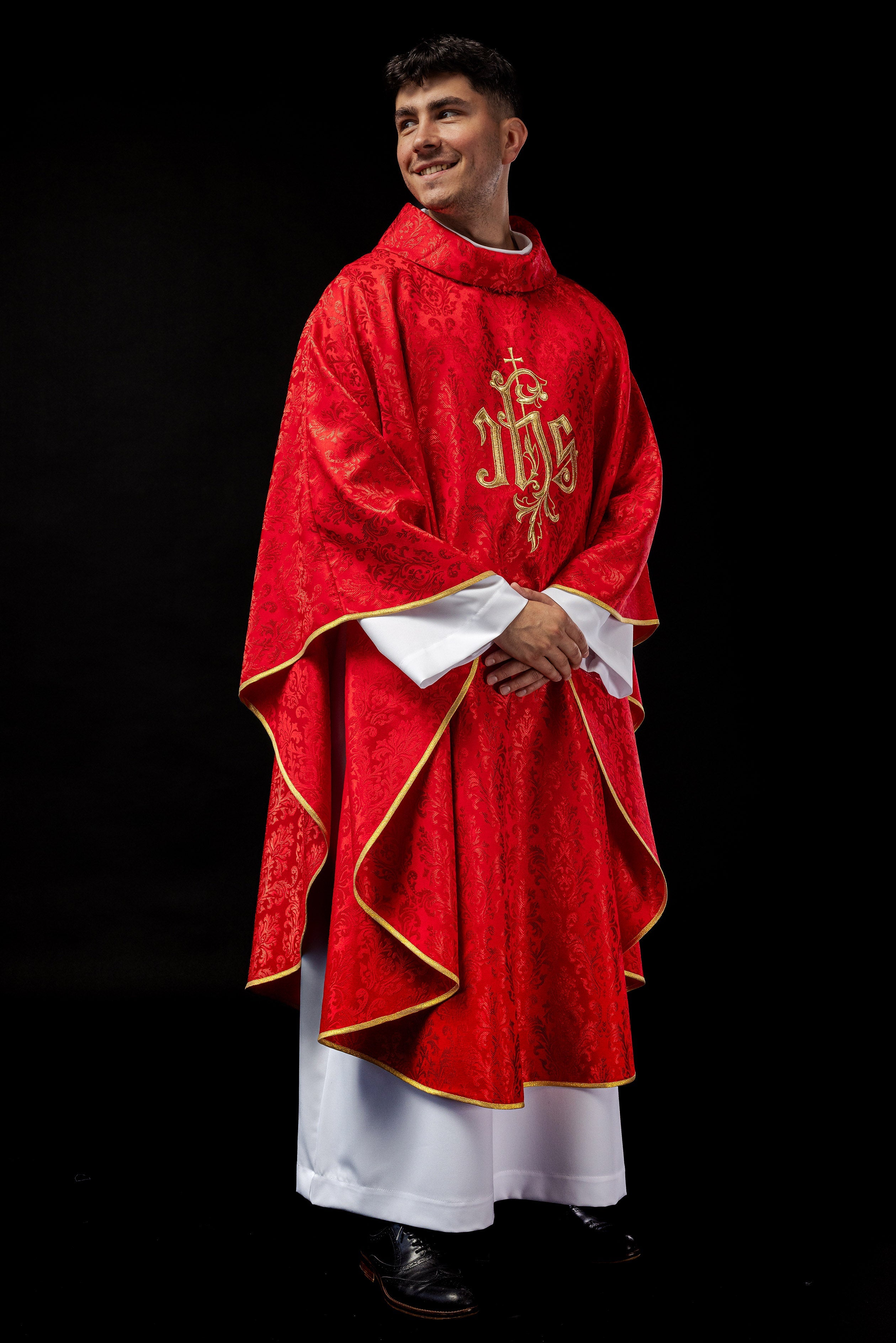 Red chasuble made of floral texture with classic IHS