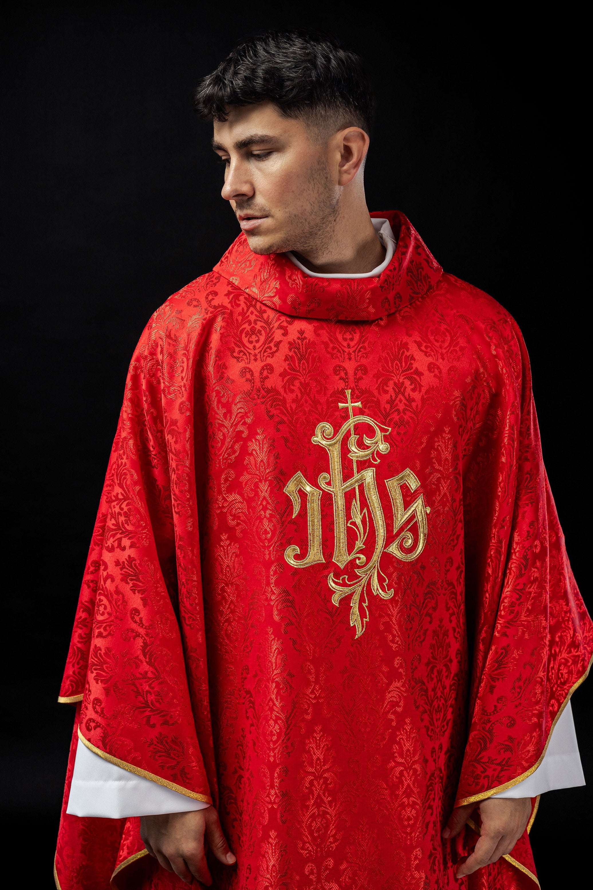 Red chasuble made of floral texture with classic IHS