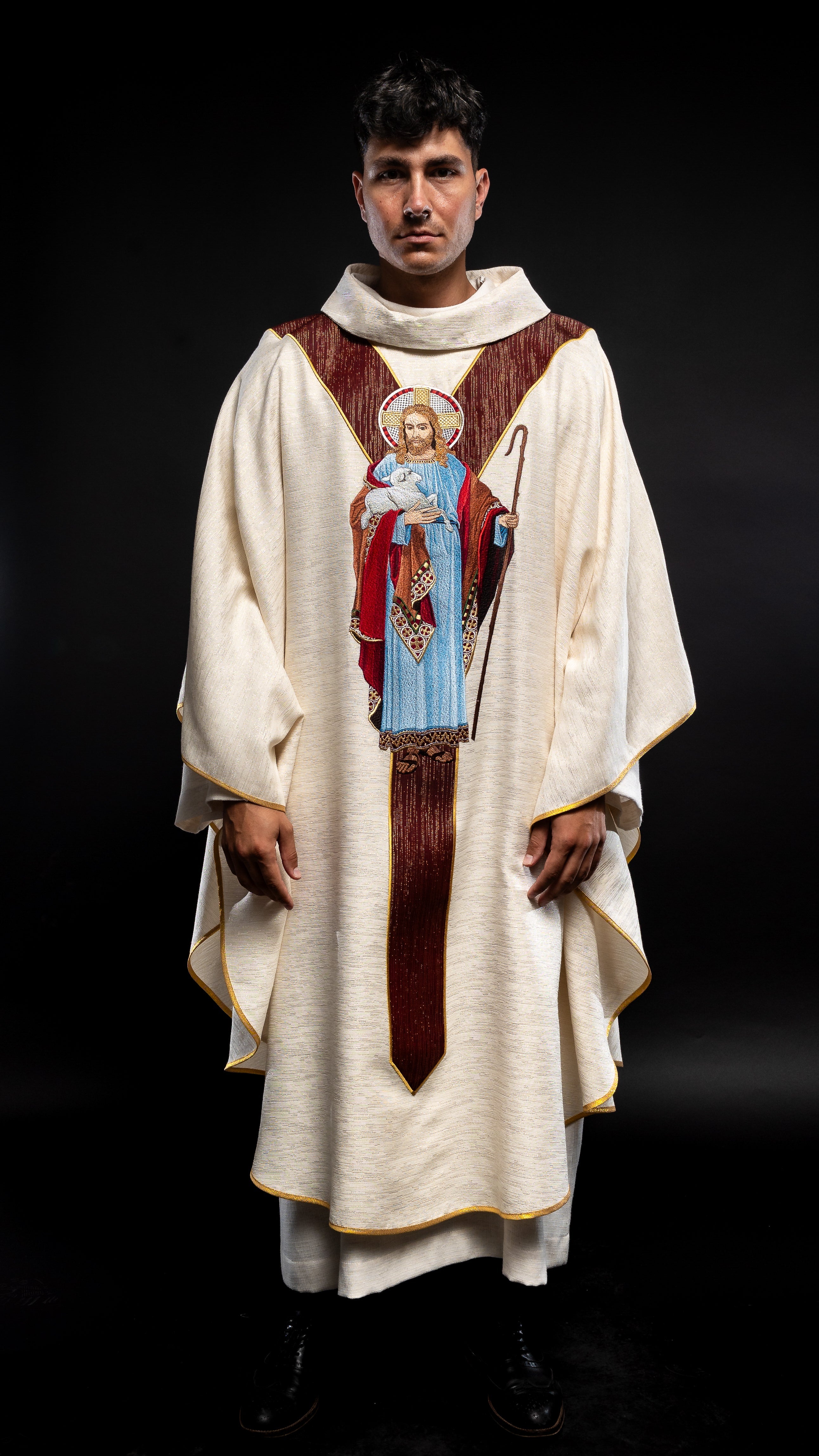 Chasuble ecru with the image of Jesus the Good Shepherd with a decorative burgundy stripe