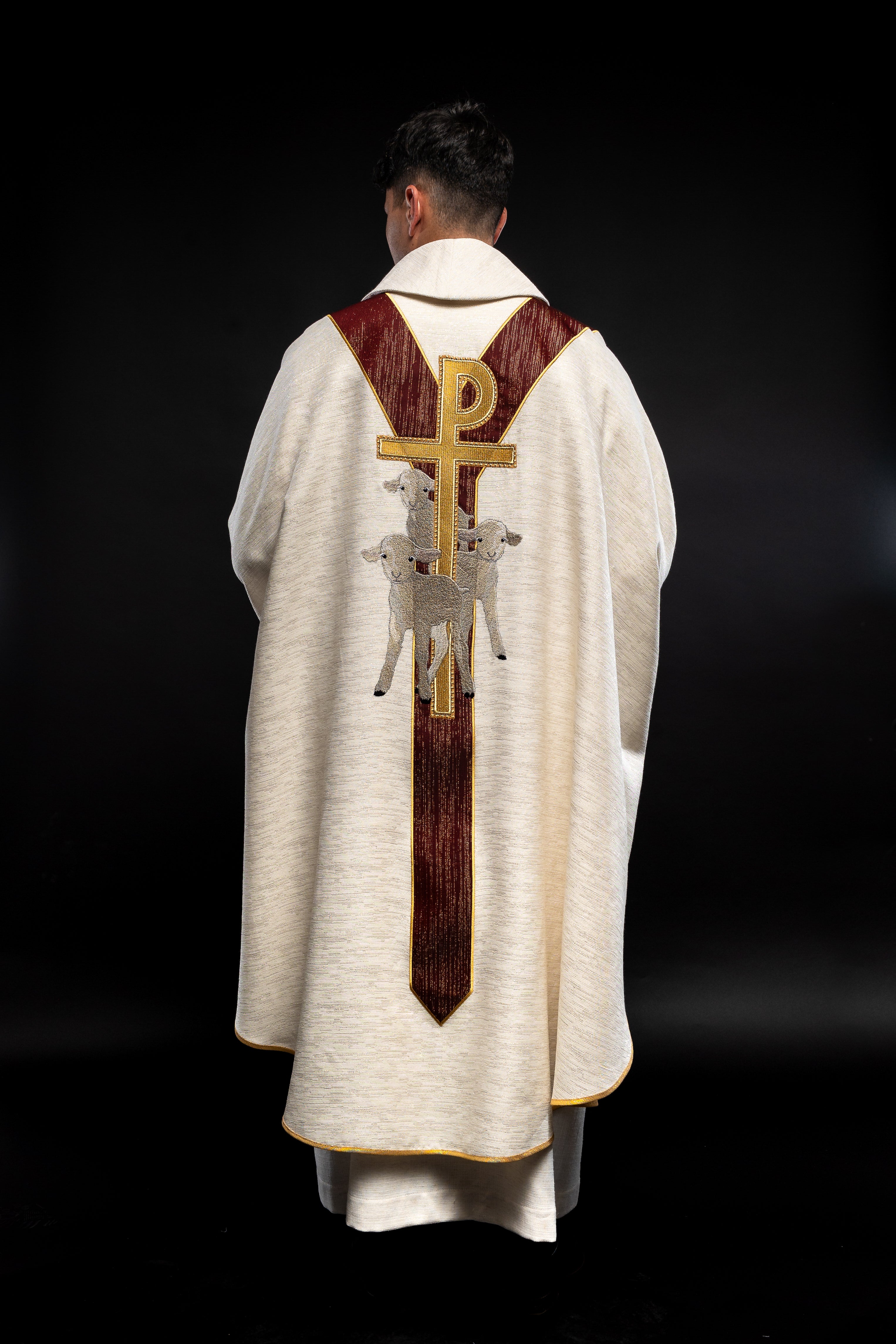 Chasuble ecru with the image of Jesus the Good Shepherd with a decorative burgundy stripe - HAFTINAUSA.COM