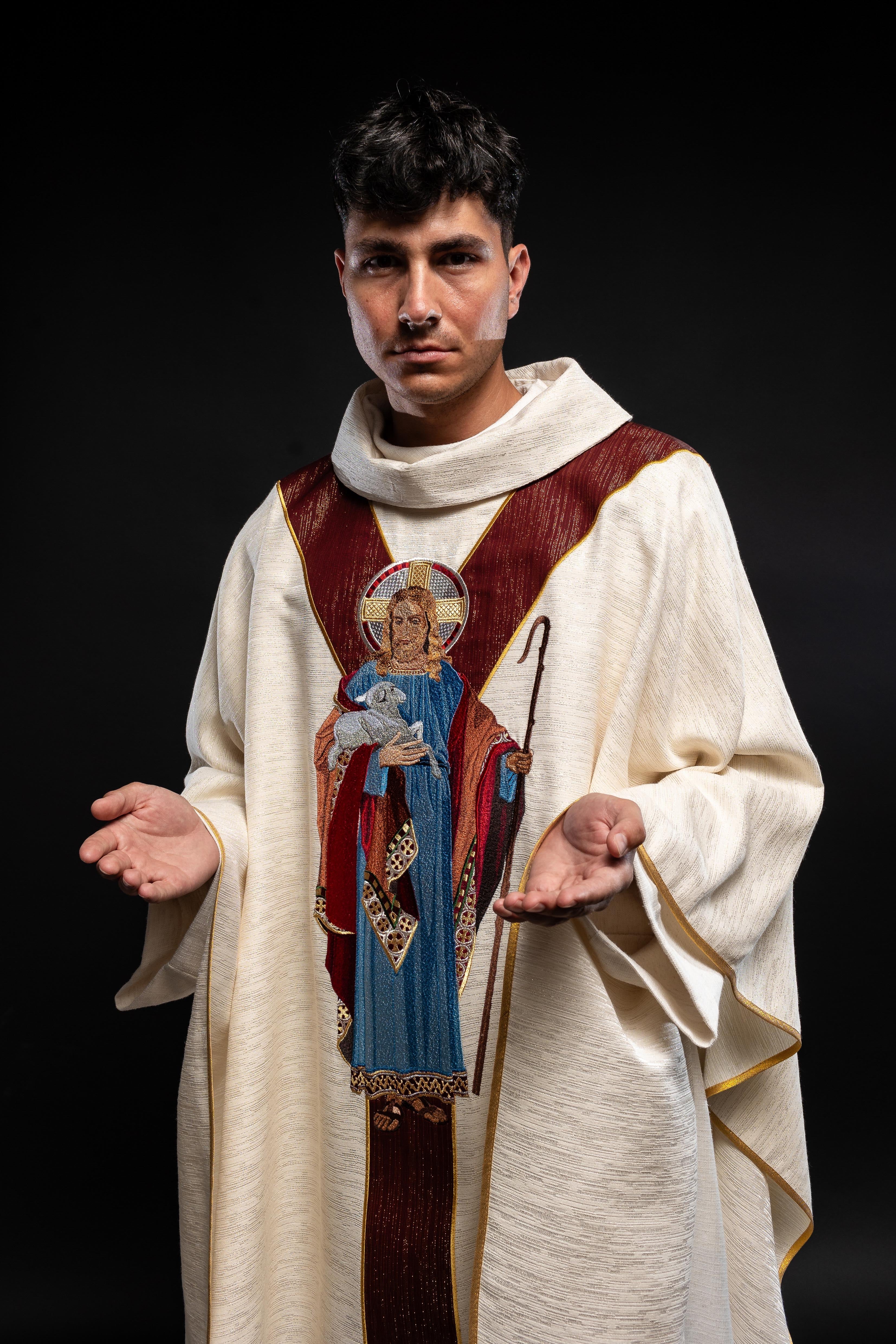 Chasuble ecru with the image of Jesus the Good Shepherd with a decorative burgundy stripe