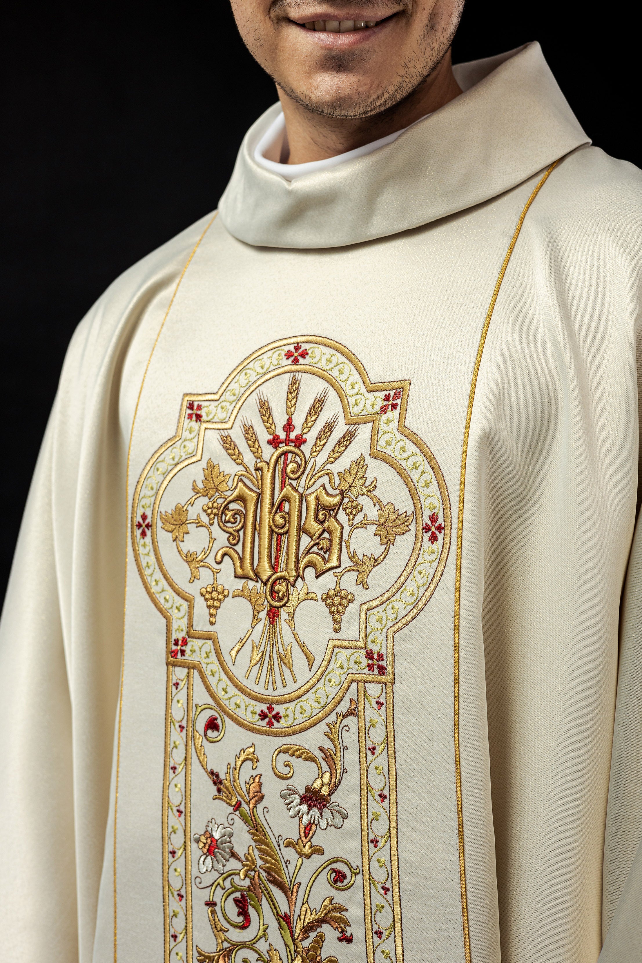 Ecru chasuble richly decorated with IHS motif