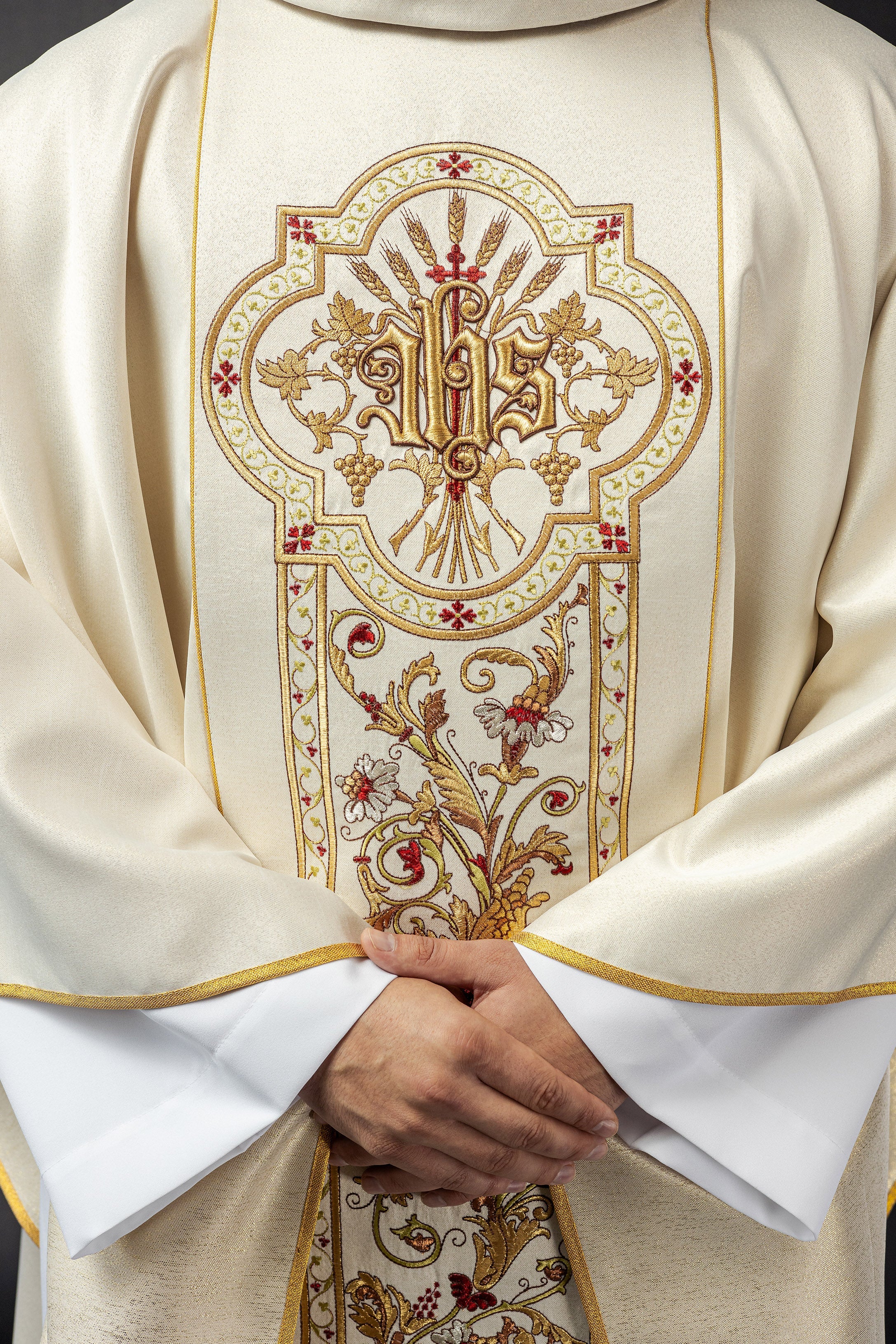 Ecru chasuble richly decorated with IHS motif