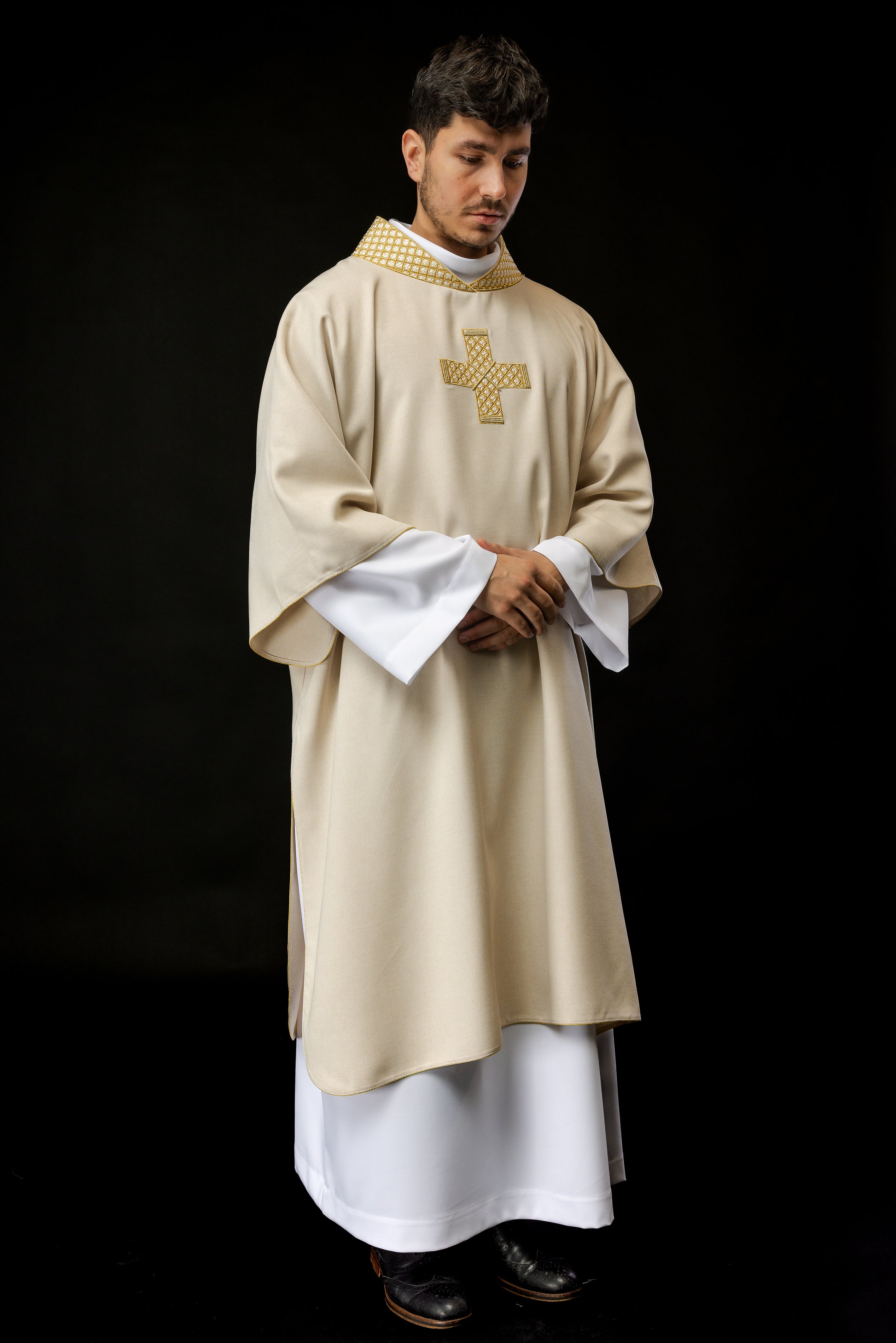 Ivory dalmatic with decorated gold collar and cross embroidery