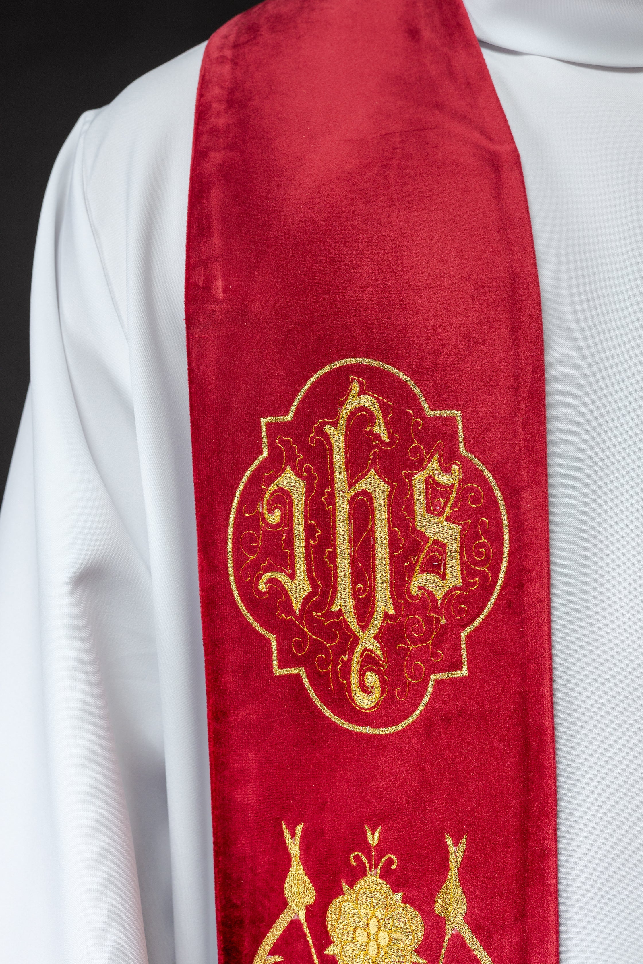 Priest stole in red with gold JHS and tassels