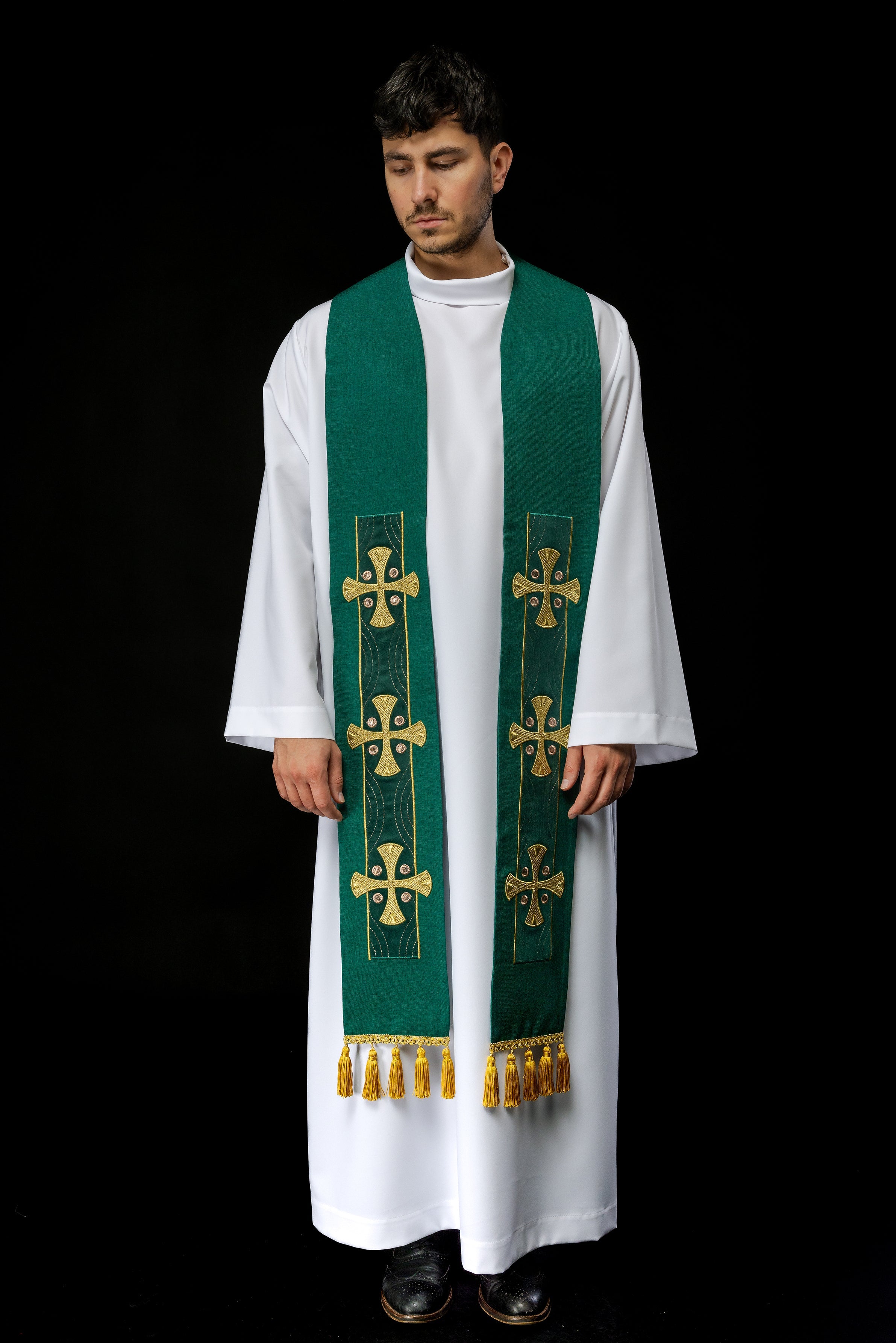 Modern green liturgical stole with three gold crosses and tassels